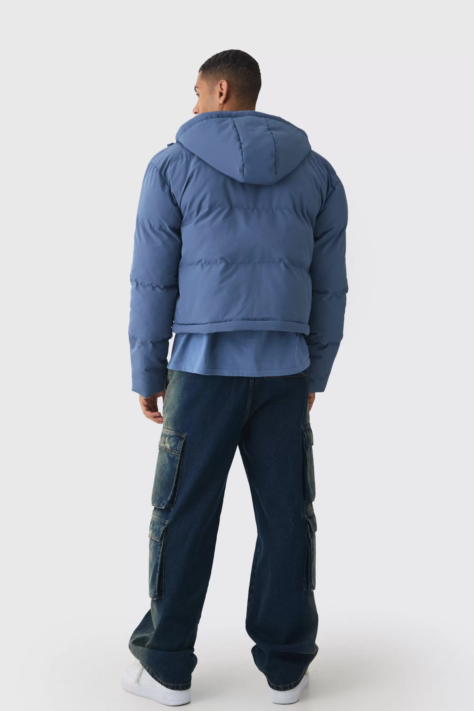 boohooMAN 2 In 1 Zip Off Longline Puffer Coat In | UK
