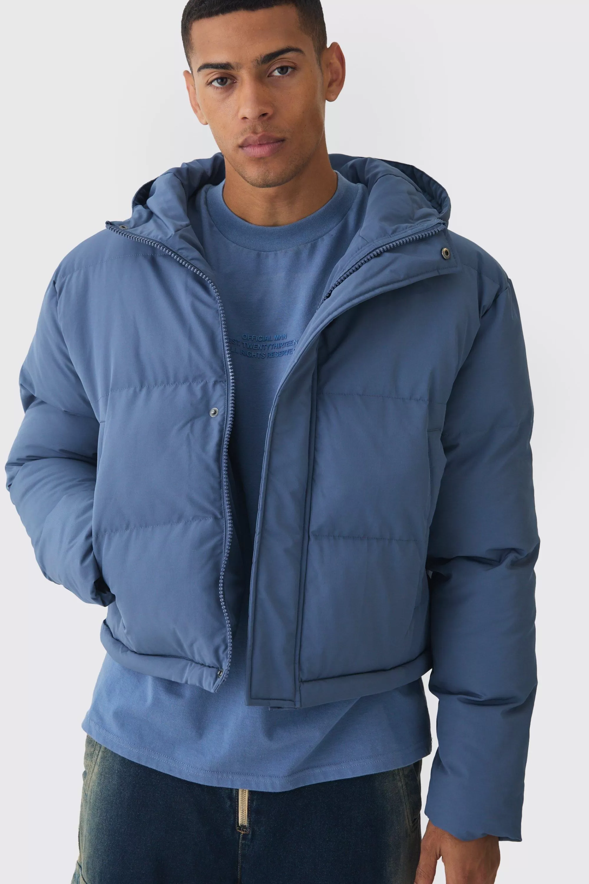 boohooMAN 2 In 1 Zip Off Longline Puffer Coat In | UK