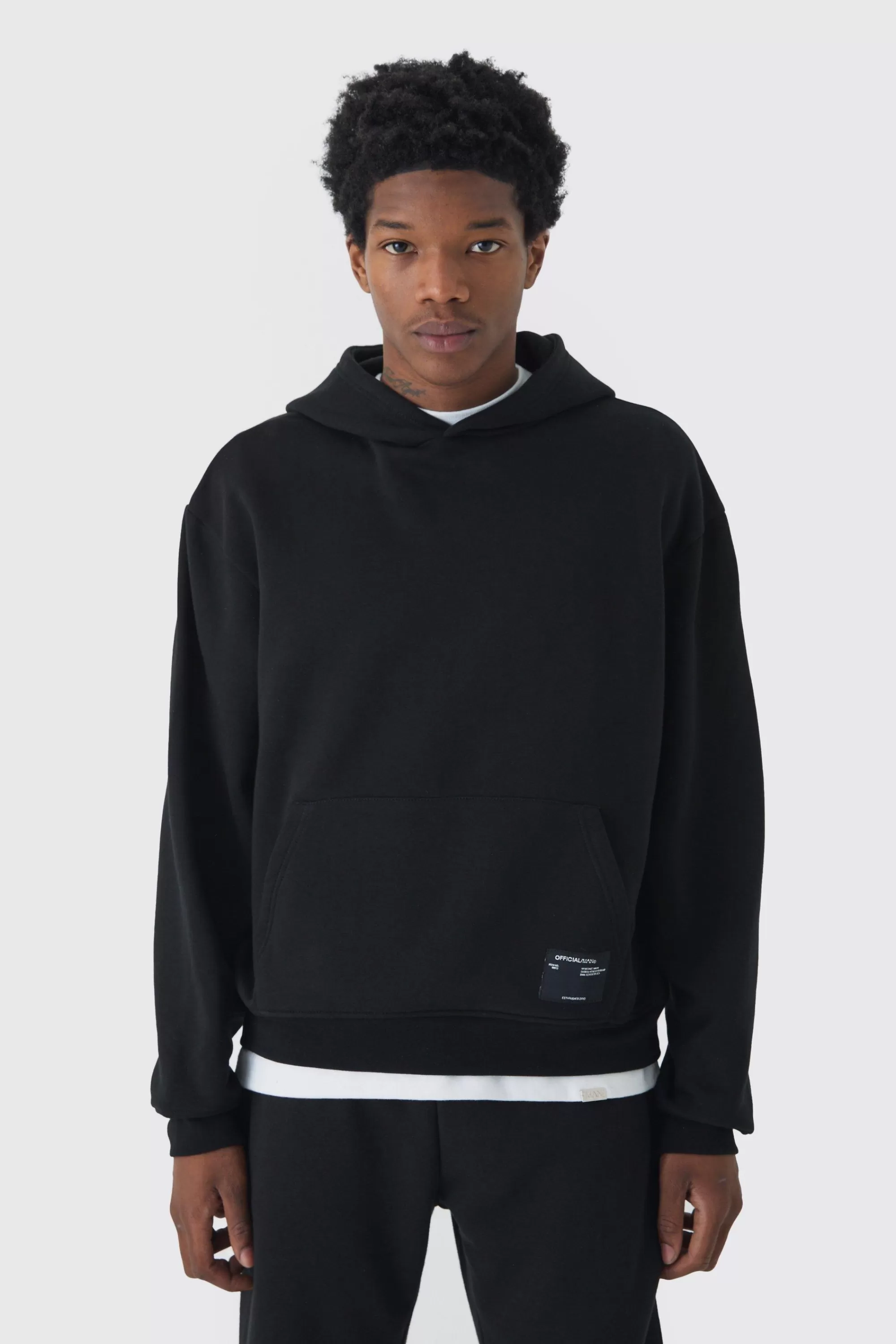boohooMAN 330GSM Oversized Boxy Over The Head Hoodie With Woven Branding | UK