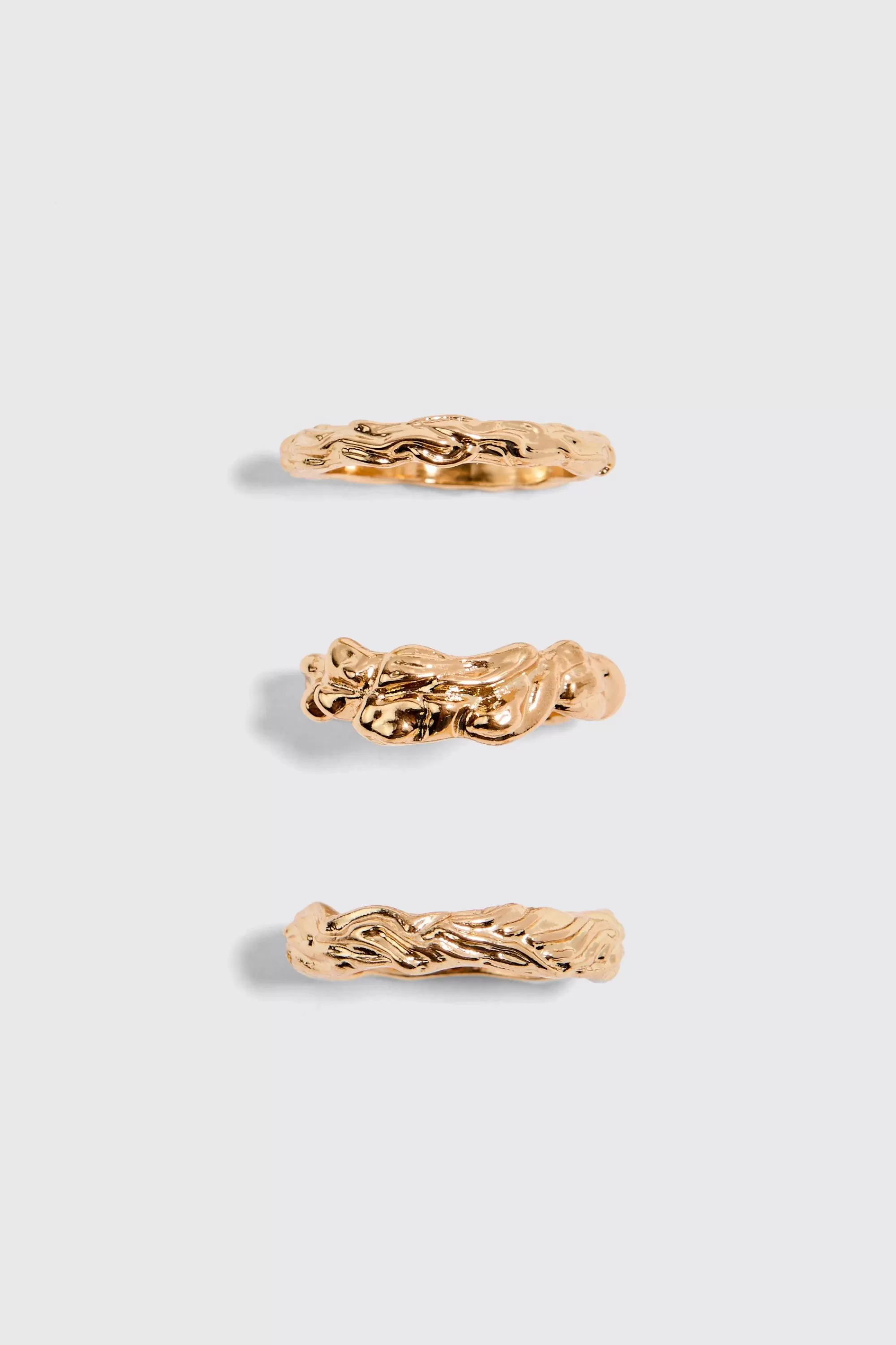 boohooMAN 3 Pack Melted Effect Rings In | UK