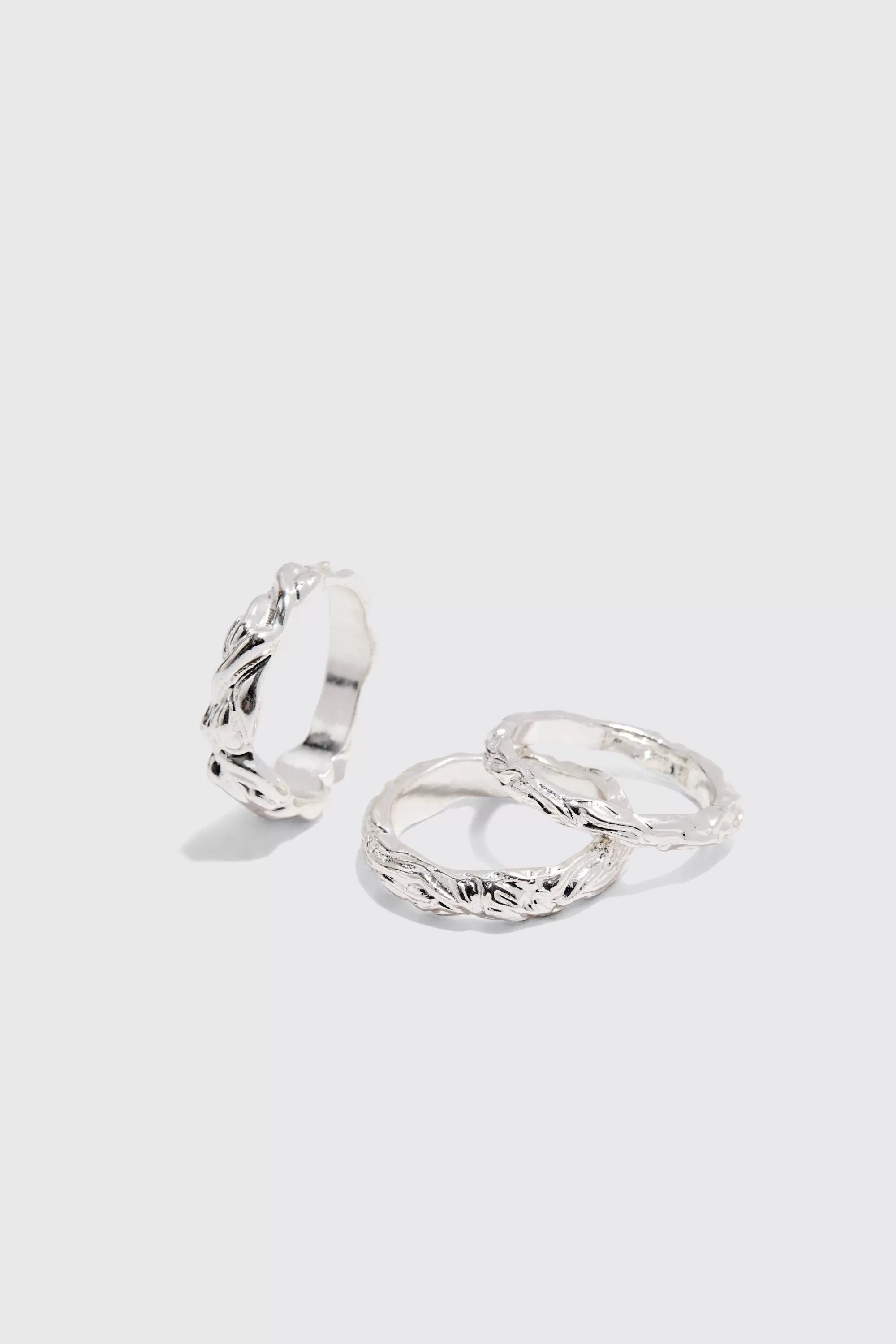 boohooMAN 3 Pack Melted Effect Rings In | UK