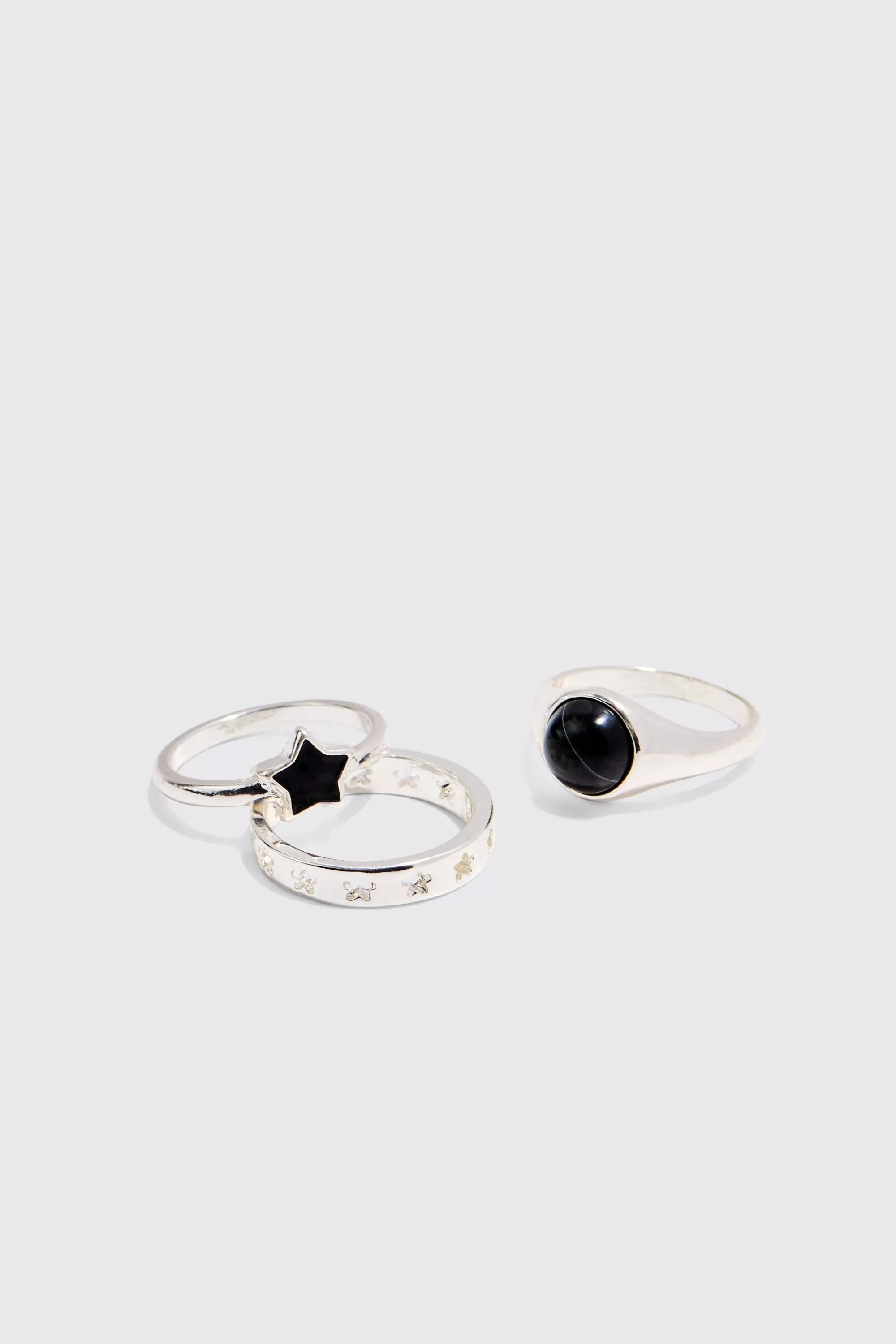 boohooMAN 3 Pack Star Graphic Rings In | UK