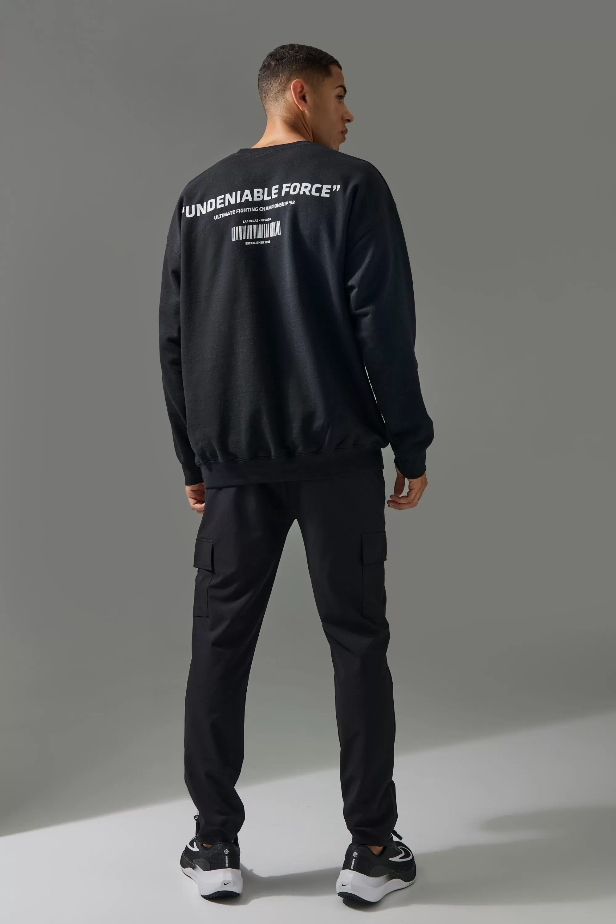 boohooMAN Active Oversized UFC Undeniable Force License Sweatshirt | UK