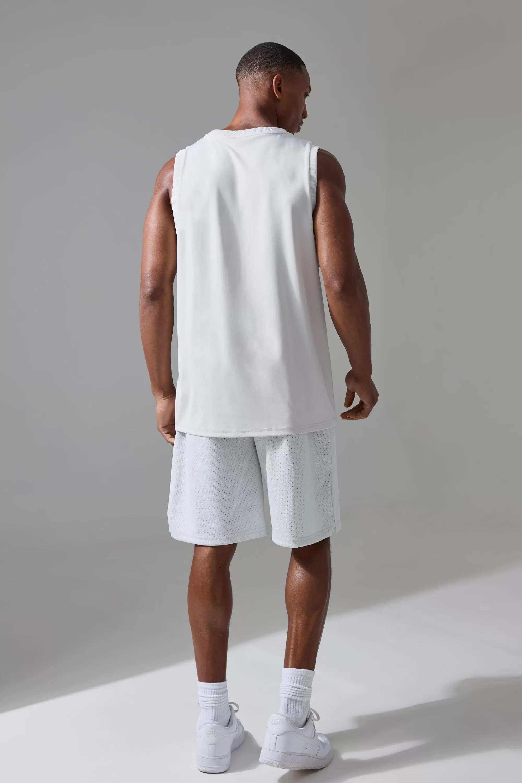 boohooMAN Active Training Dept Oversized Mesh 9inch Basketball Short | UK