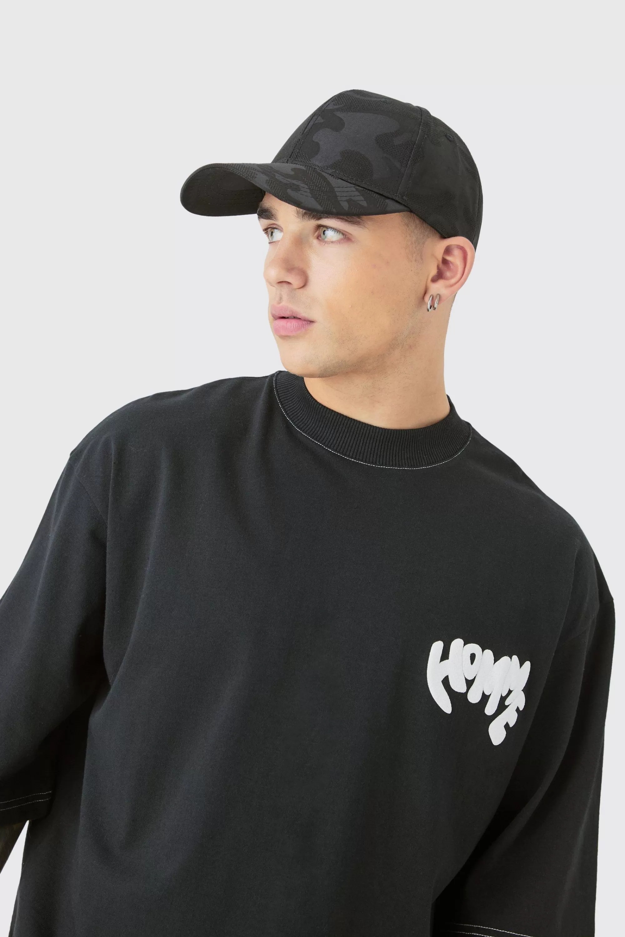 boohooMAN All Over Camo Print Cap In | UK