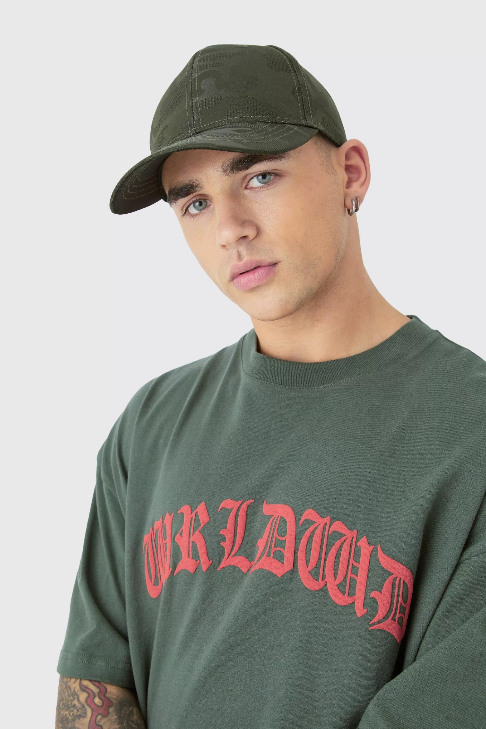 boohooMAN All Over Camo Print Cap In | UK