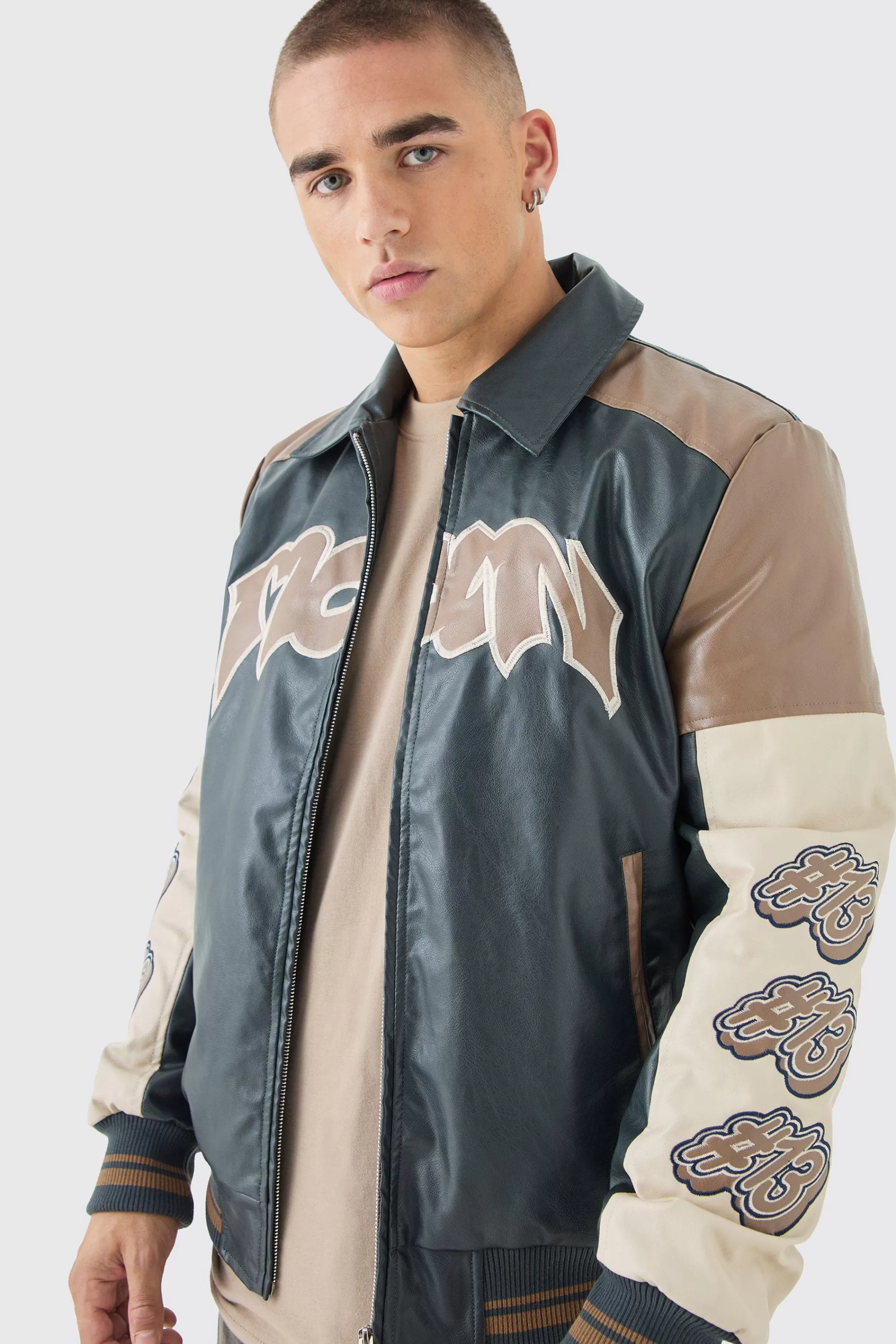 boohooMAN Badge Detail Colour Block Pu Varsity Jacket In | UK