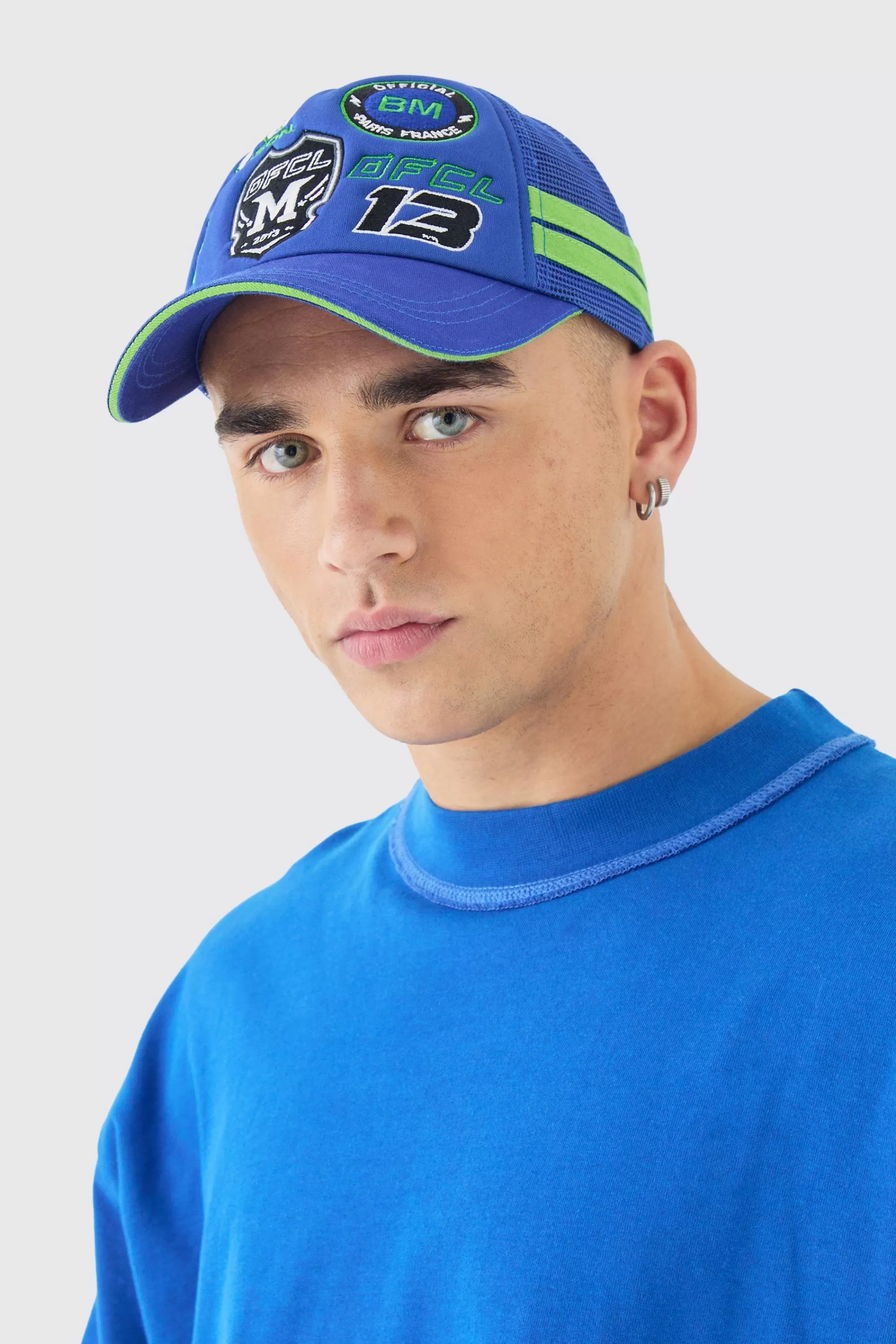 boohooMAN Badge Foam Trucker Cap In | UK