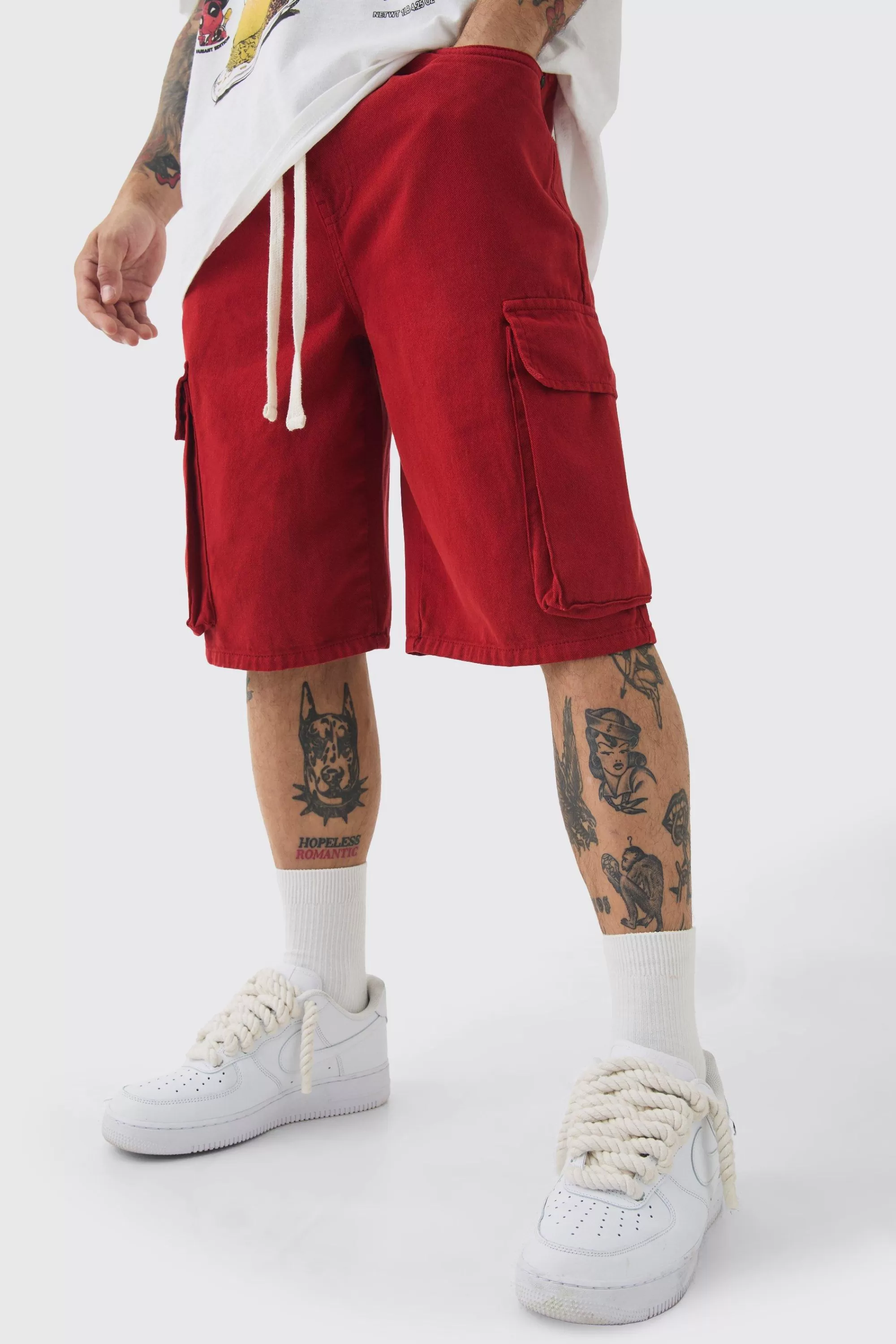 boohooMAN Baggy Fit Elasticated Waist Extended Drawcord Cargo Shorts | UK