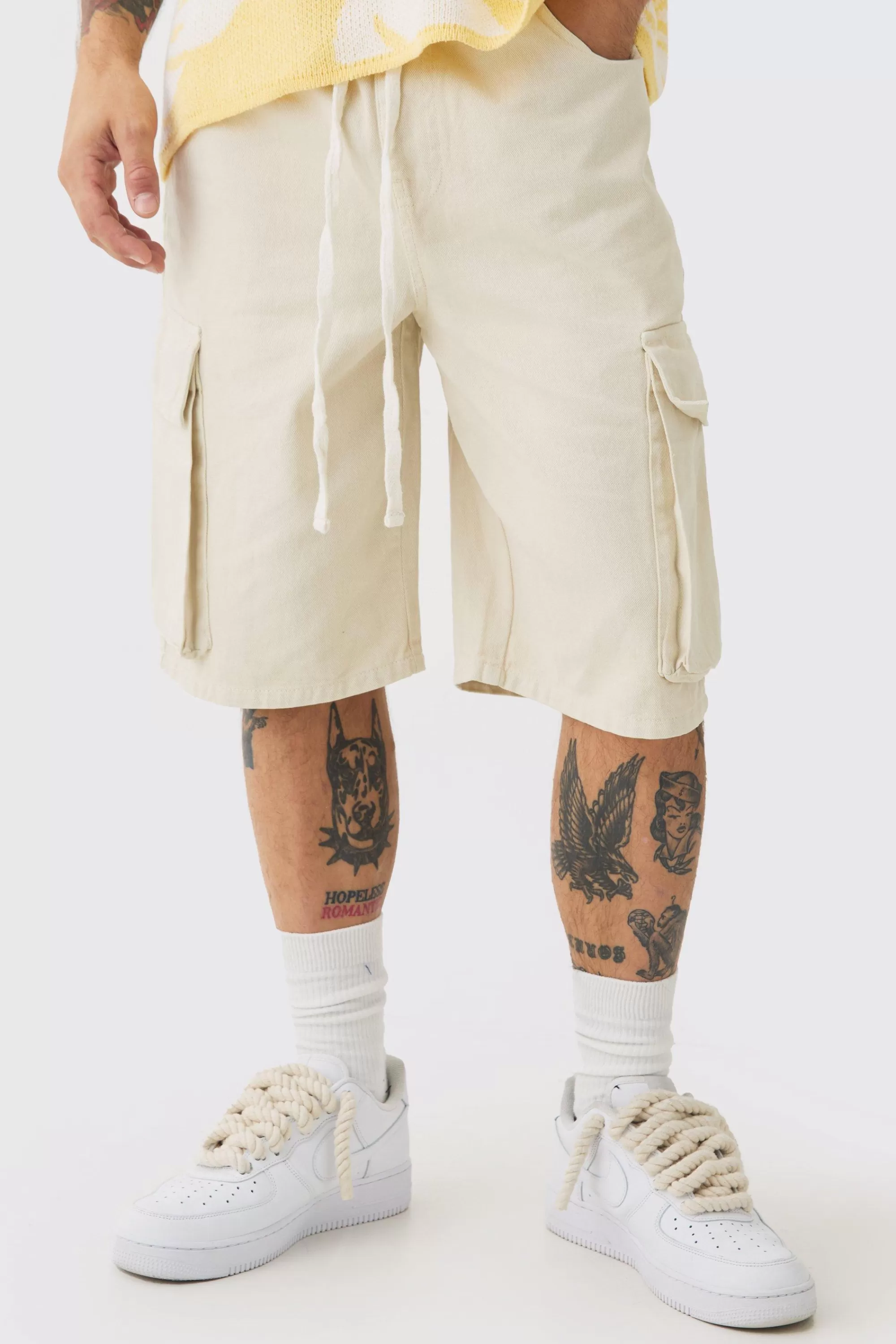 boohooMAN Baggy Fit Elasticated Waist Extended Drawcord Cargo Shorts | UK