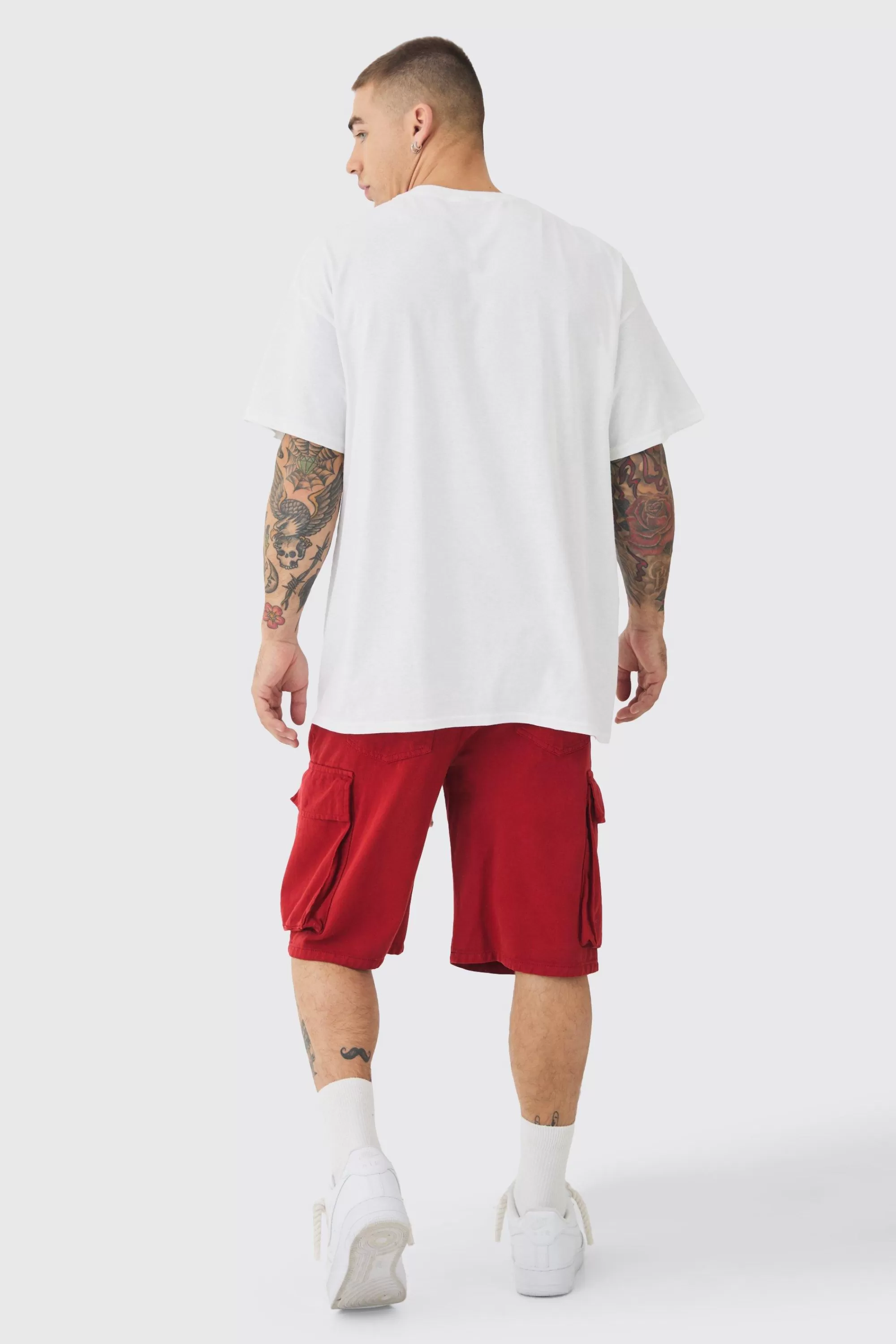 boohooMAN Baggy Fit Elasticated Waist Extended Drawcord Cargo Shorts | UK