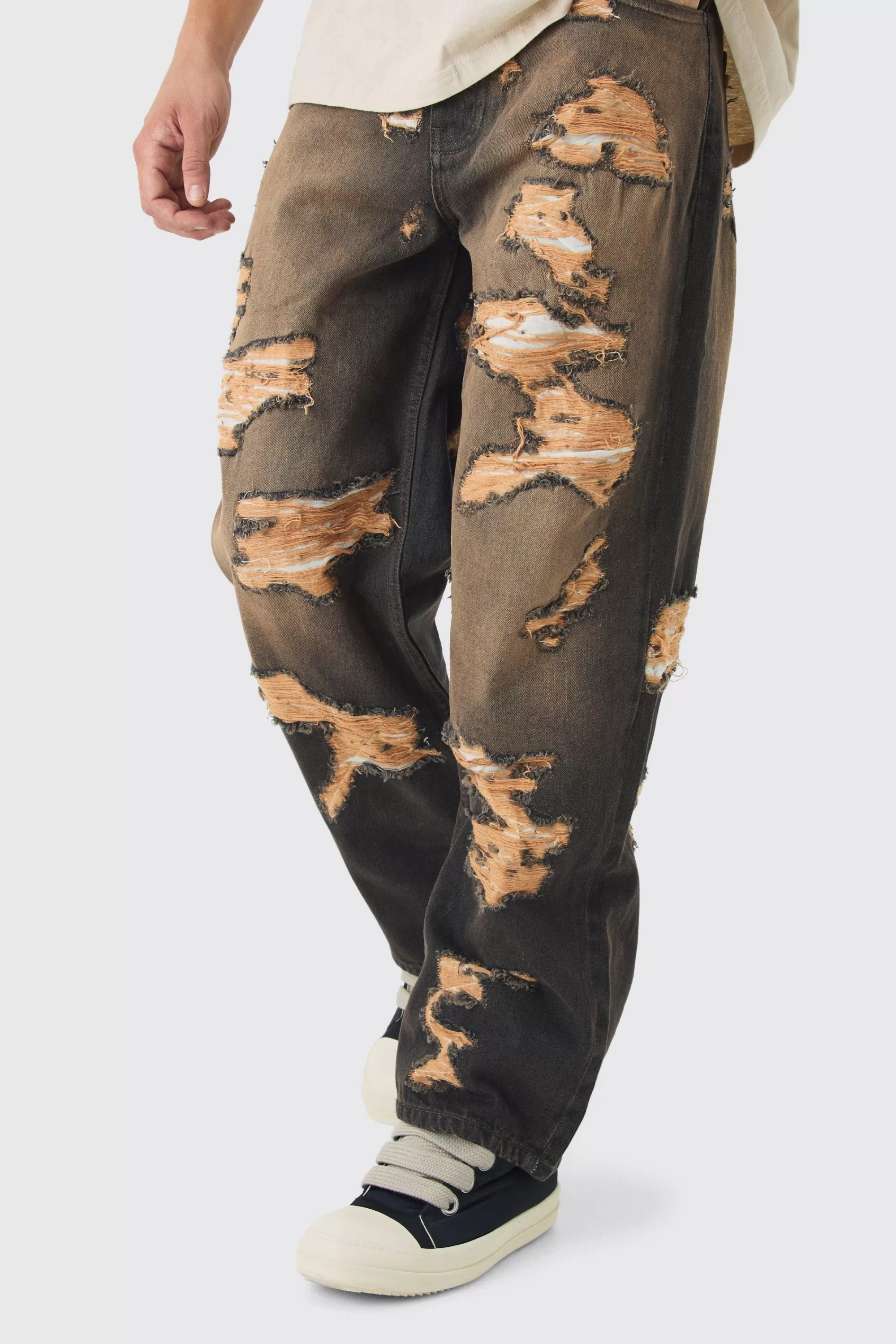 boohooMAN Baggy Fit Rigid All Over Ripped Jeans | UK