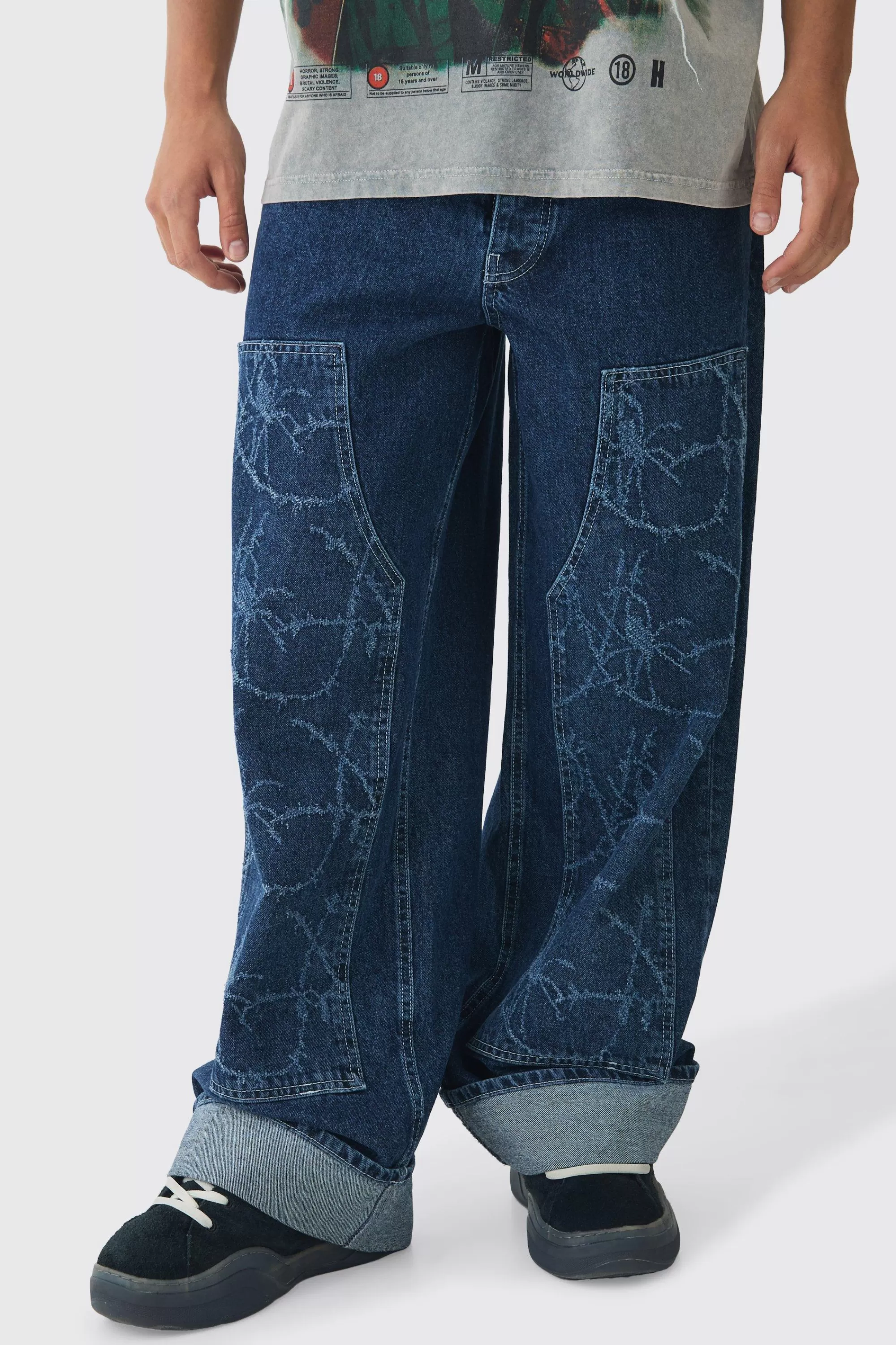 boohooMAN Baggy Fit Rigid Barbed Wire Laser Print Carpenter Jeans | UK