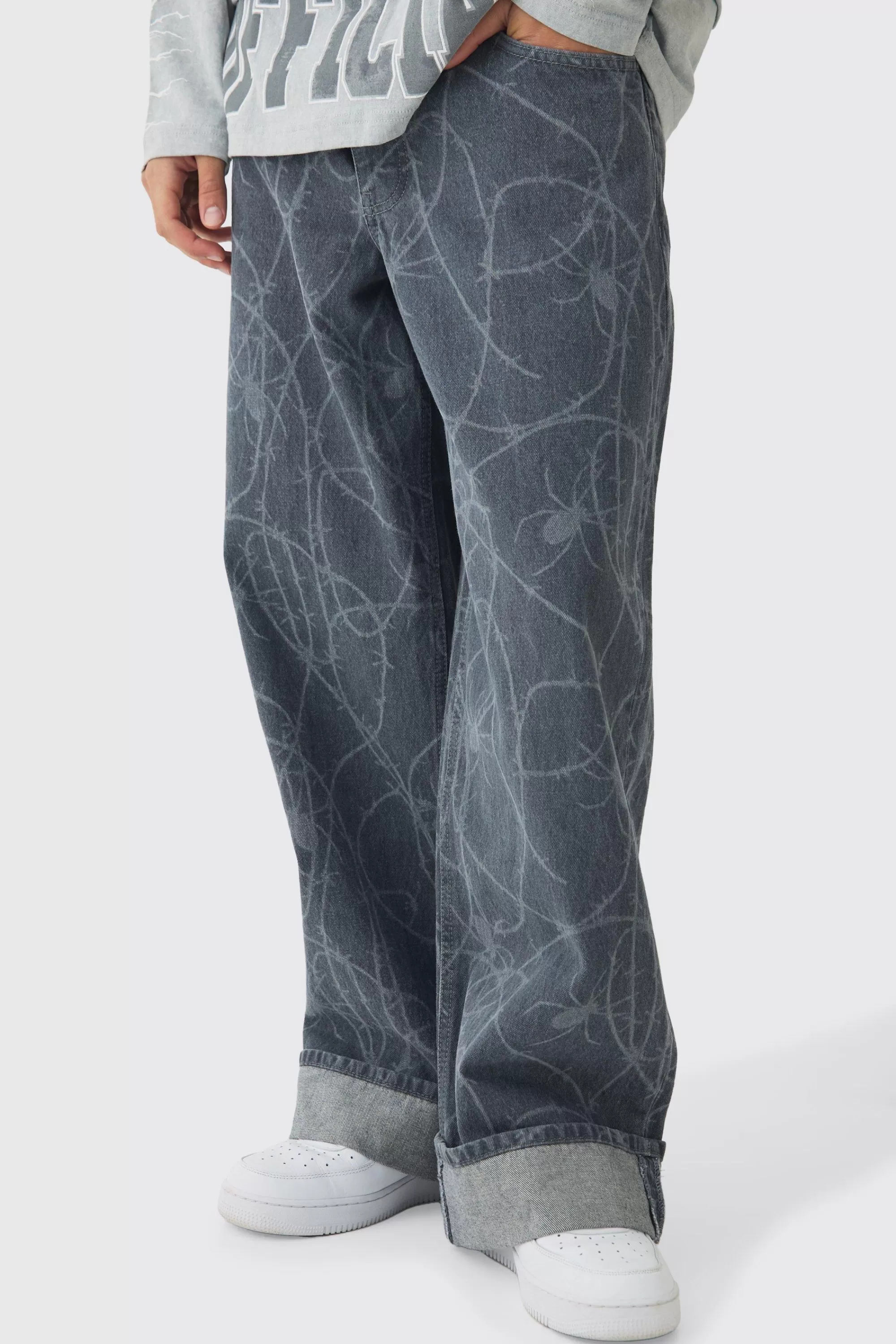 boohooMAN Baggy Fit Rigid Barbed Wire Laser Print Jeans | UK