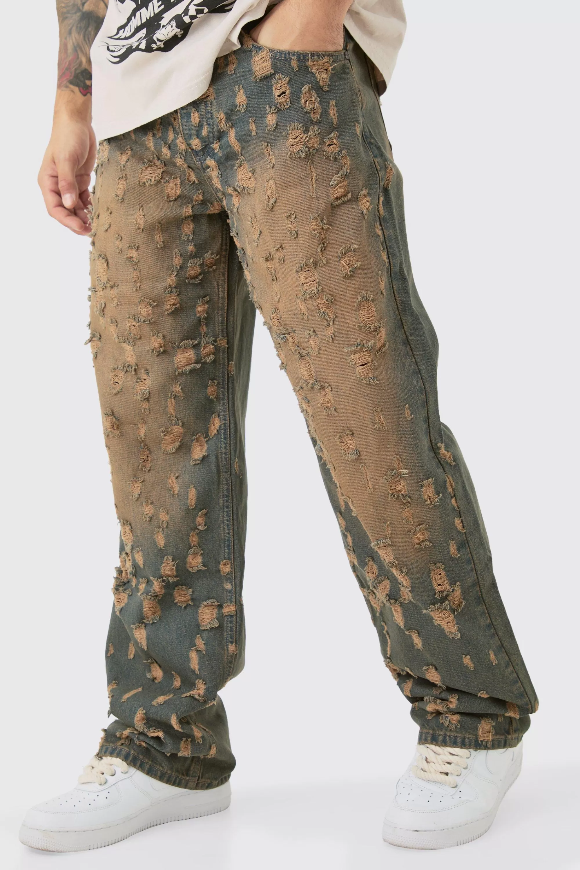boohooMAN Baggy Rigid All Over Distressed Jeans In | UK