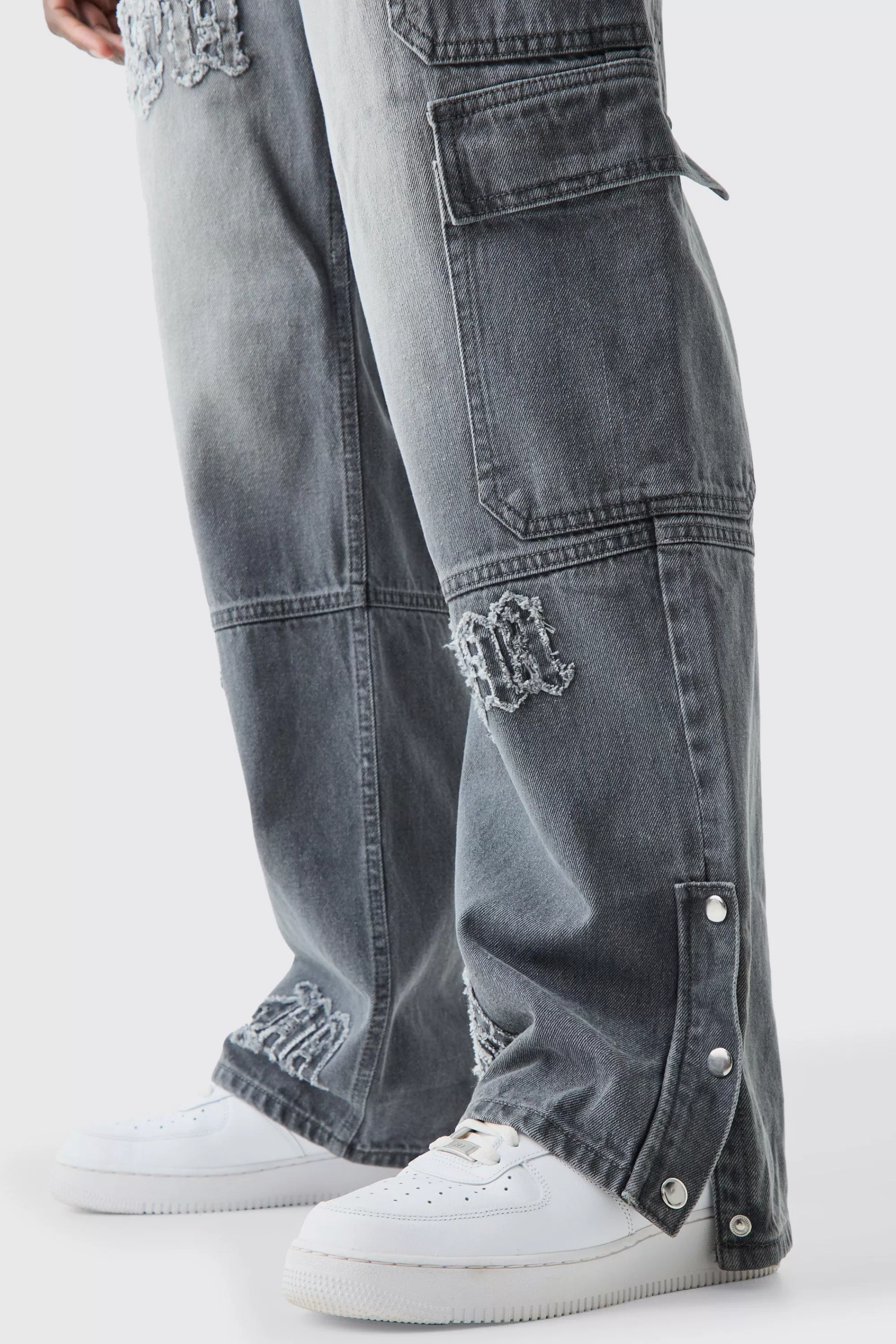 boohooMAN Baggy Rigid Bm Applique Multi Pocket Cargo Jeans In | UK