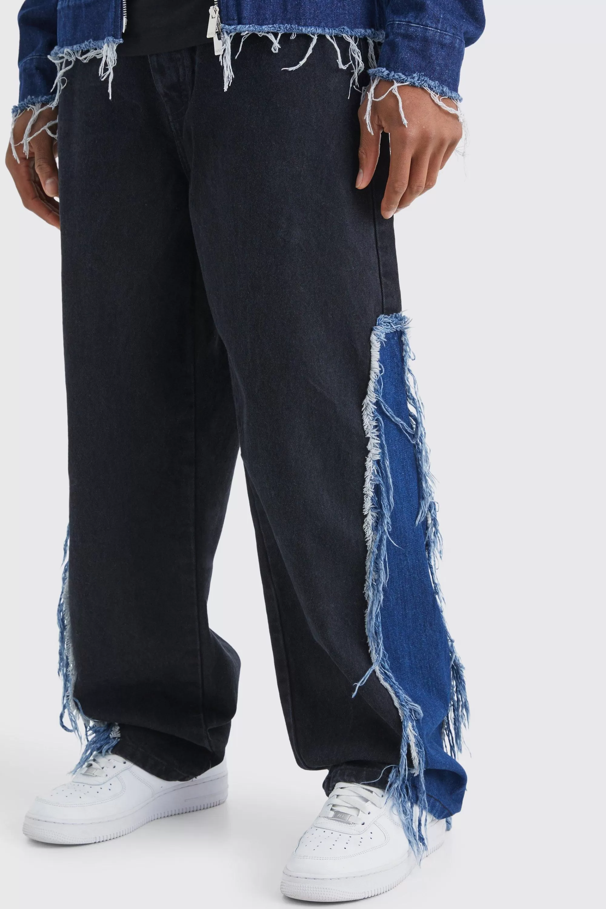 boohooMAN Baggy Rigid Frayed Spliced Jeans In | UK