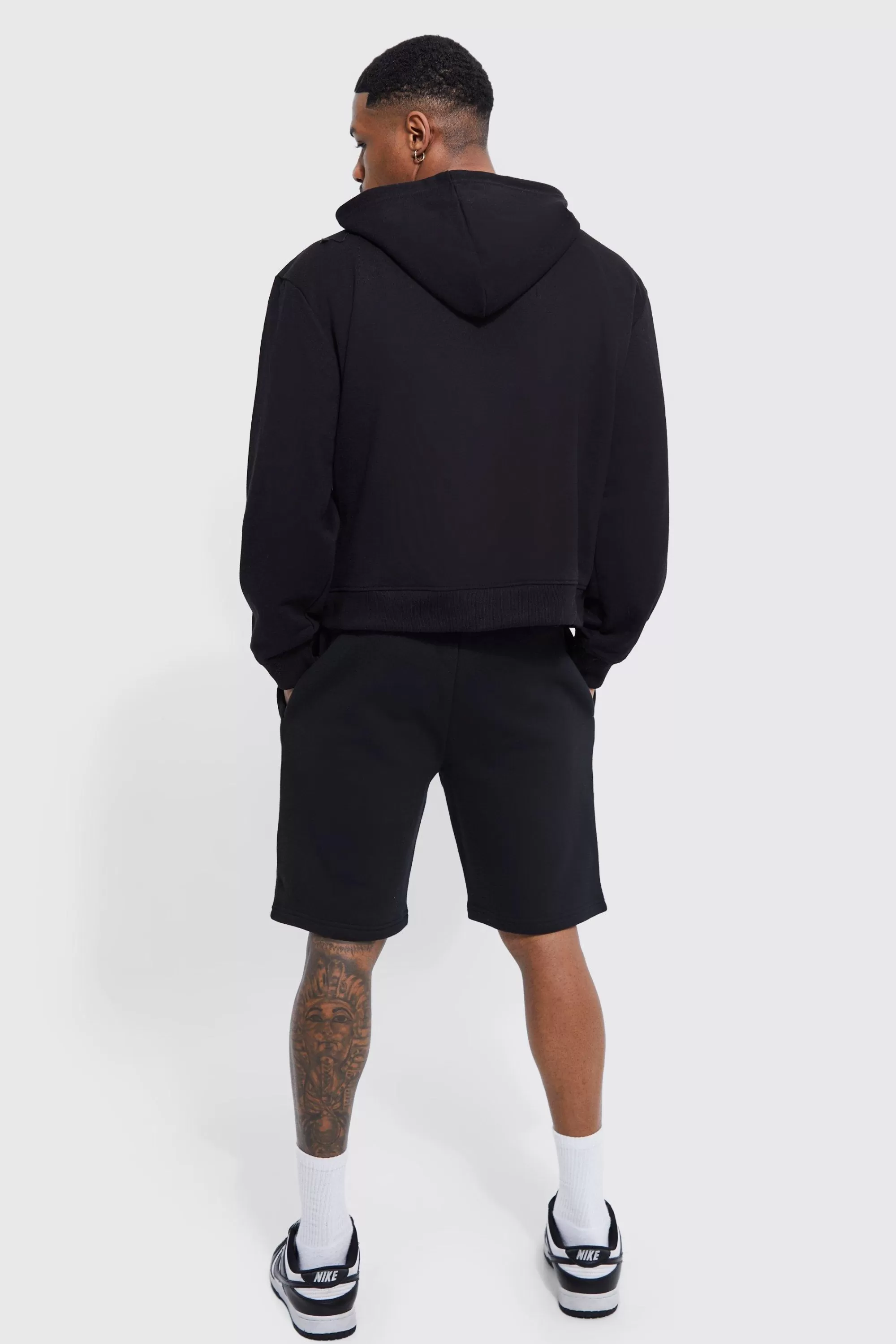 boohooMAN Basic Loose Fit Mid Length Jersey Short | UK