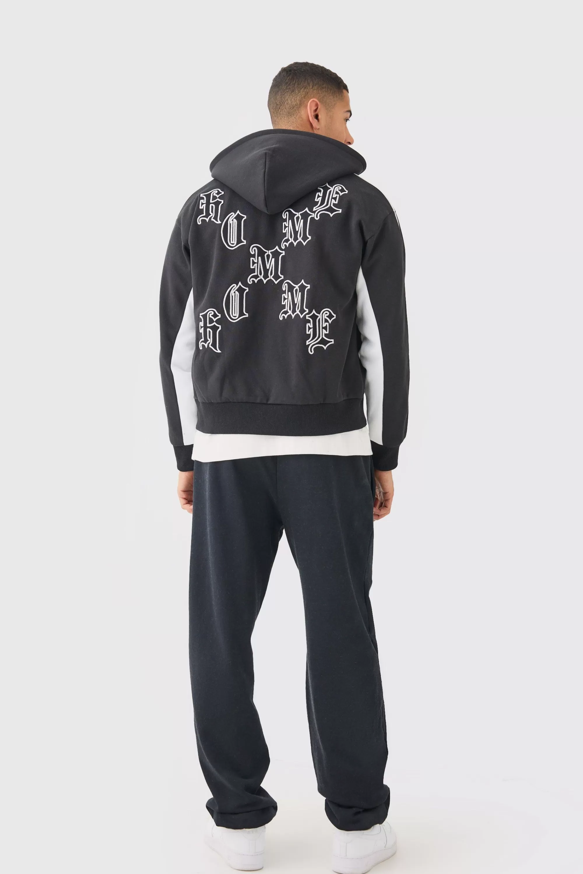 boohooMAN Boxy Applique Tape Detail Jersey Varisty Jacket | UK