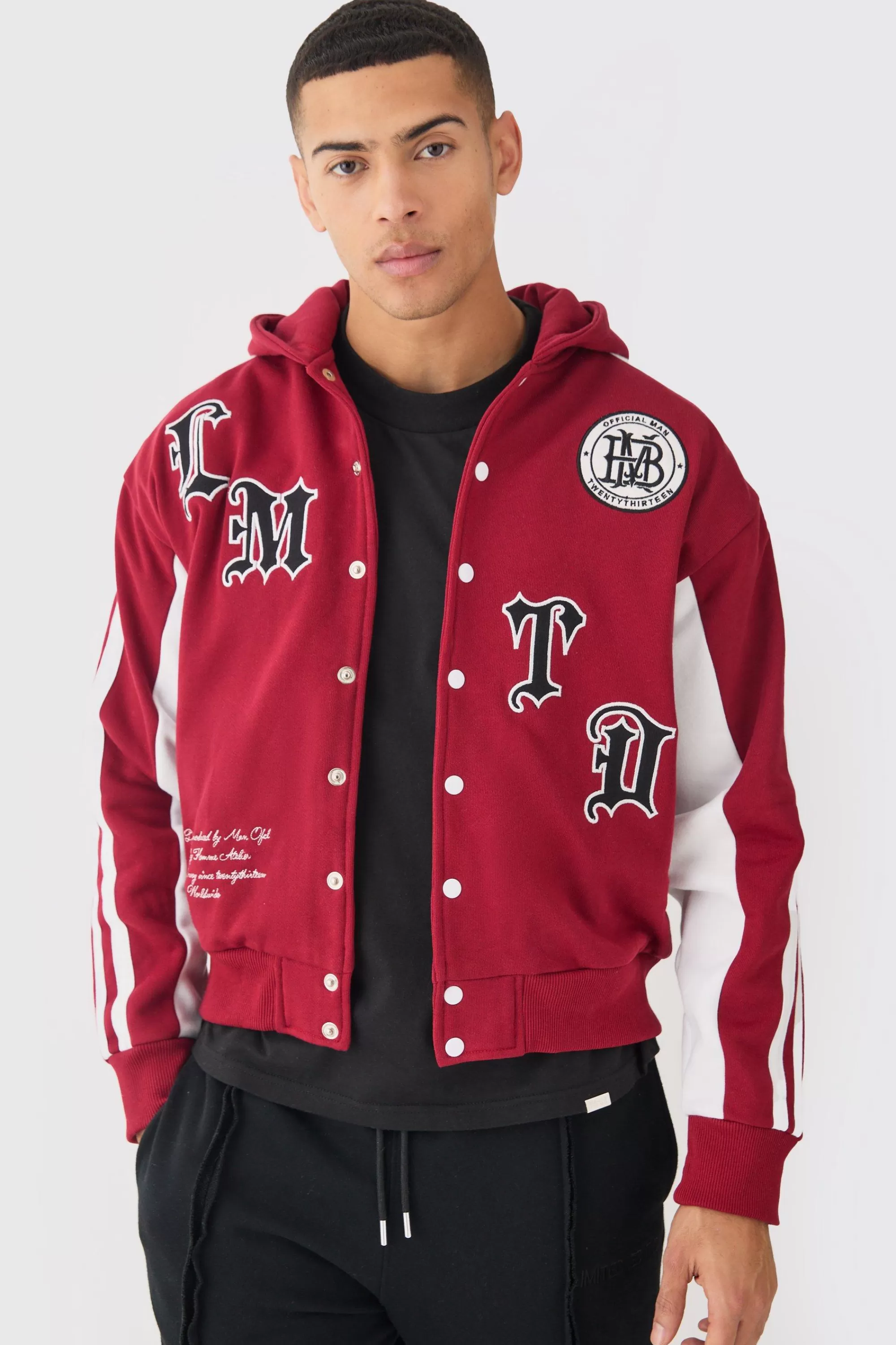 boohooMAN Boxy Applique Tape Detail Jersey Varsity Jacket | UK