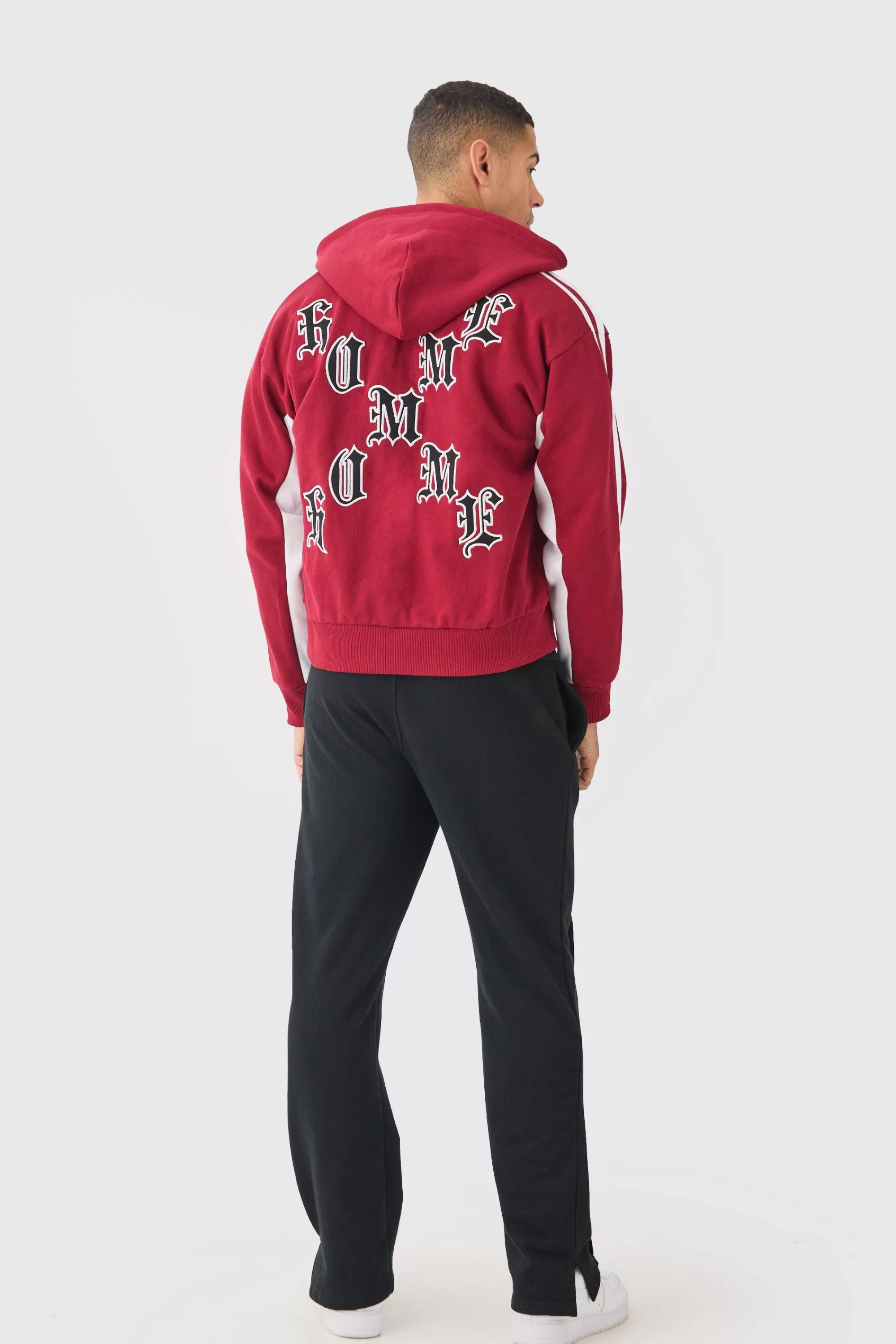 boohooMAN Boxy Applique Tape Detail Jersey Varsity Jacket | UK