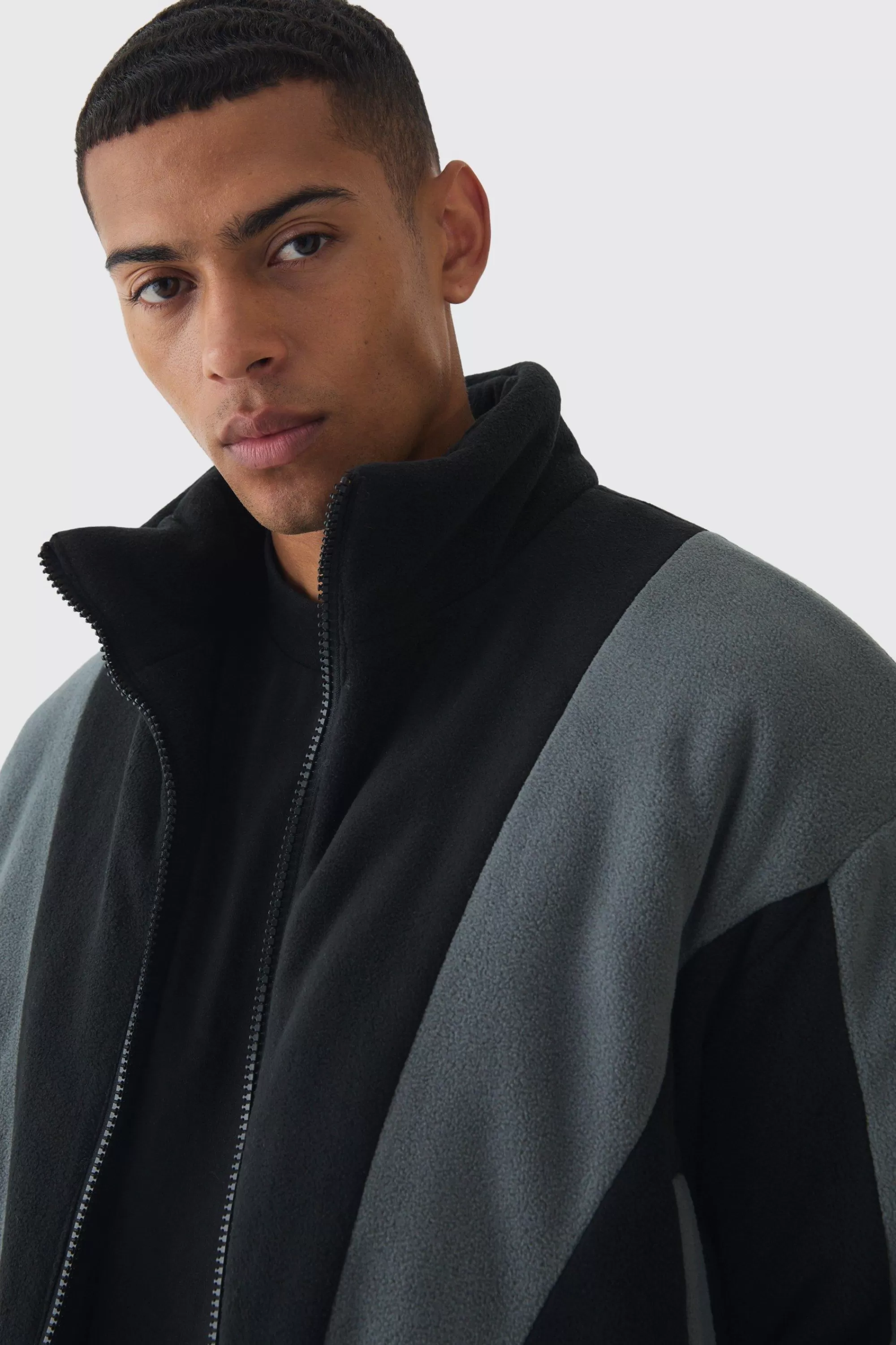 boohooMAN Boxy Colour Block Funnel Neck Fleece Jacket In | UK