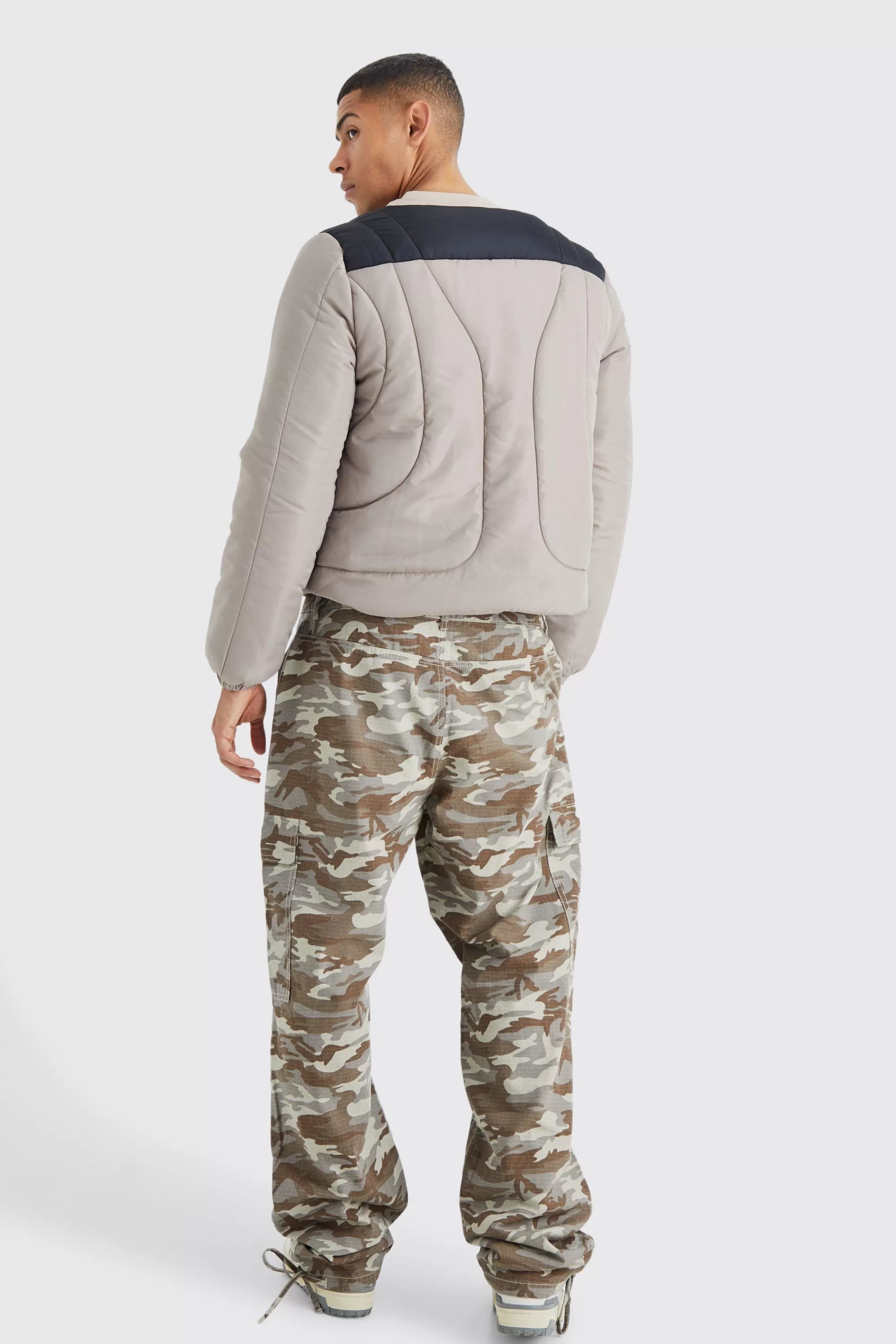 boohooMAN Boxy Curved Quilted Puffer | UK