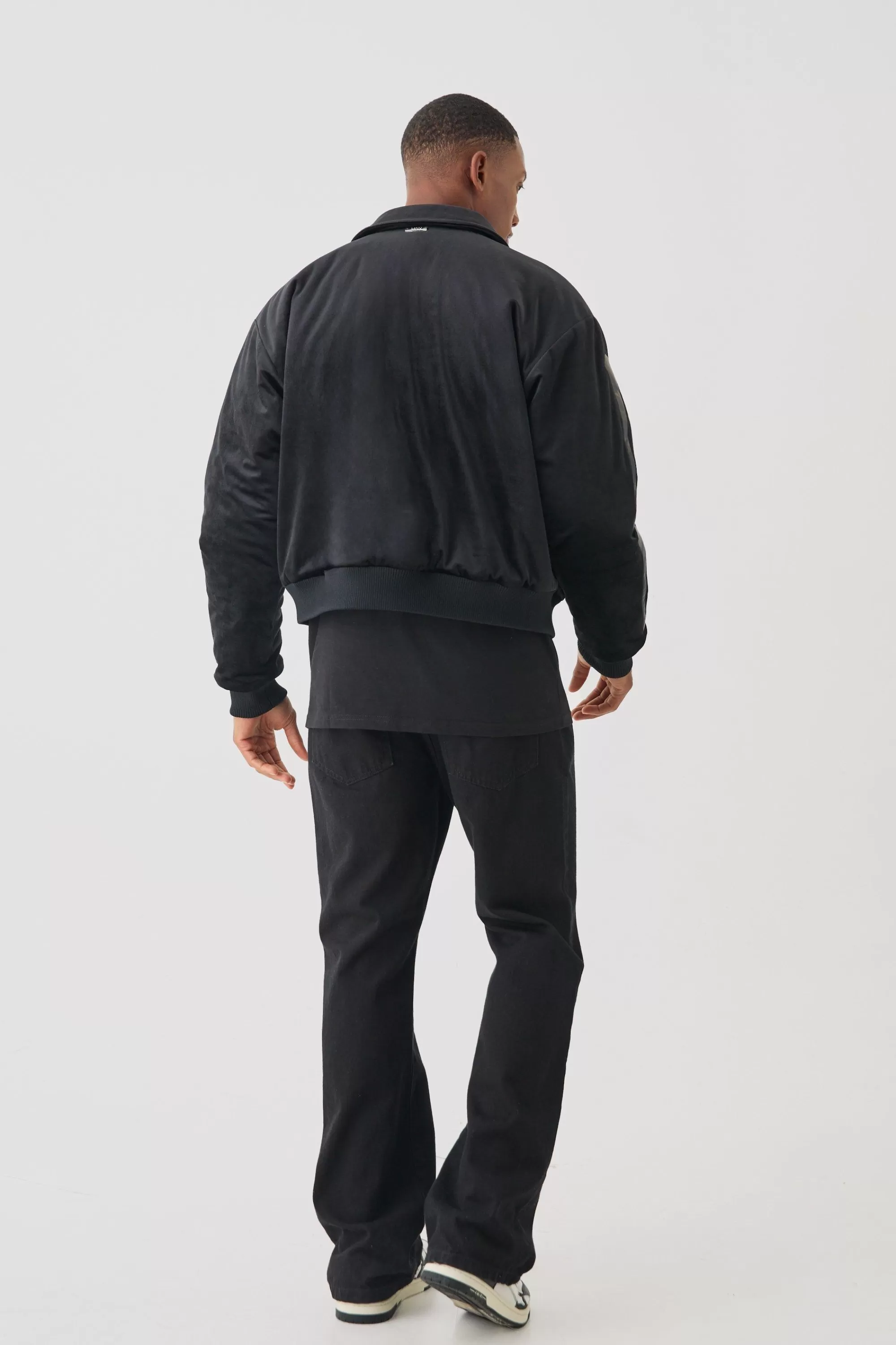 boohooMAN Boxy Fit Skeleton Applique Varsity Jacket | UK