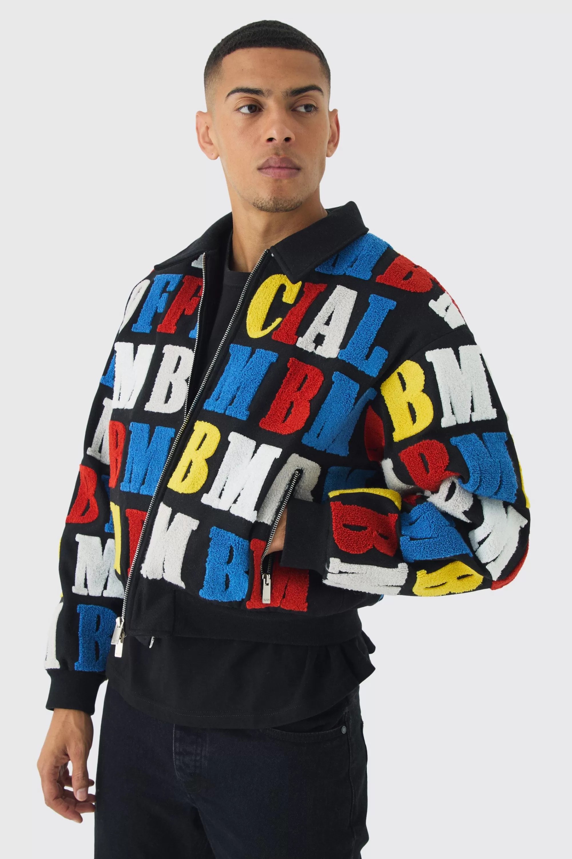 boohooMAN Boxy Letter Badge Collared Varsity Jacket In | UK