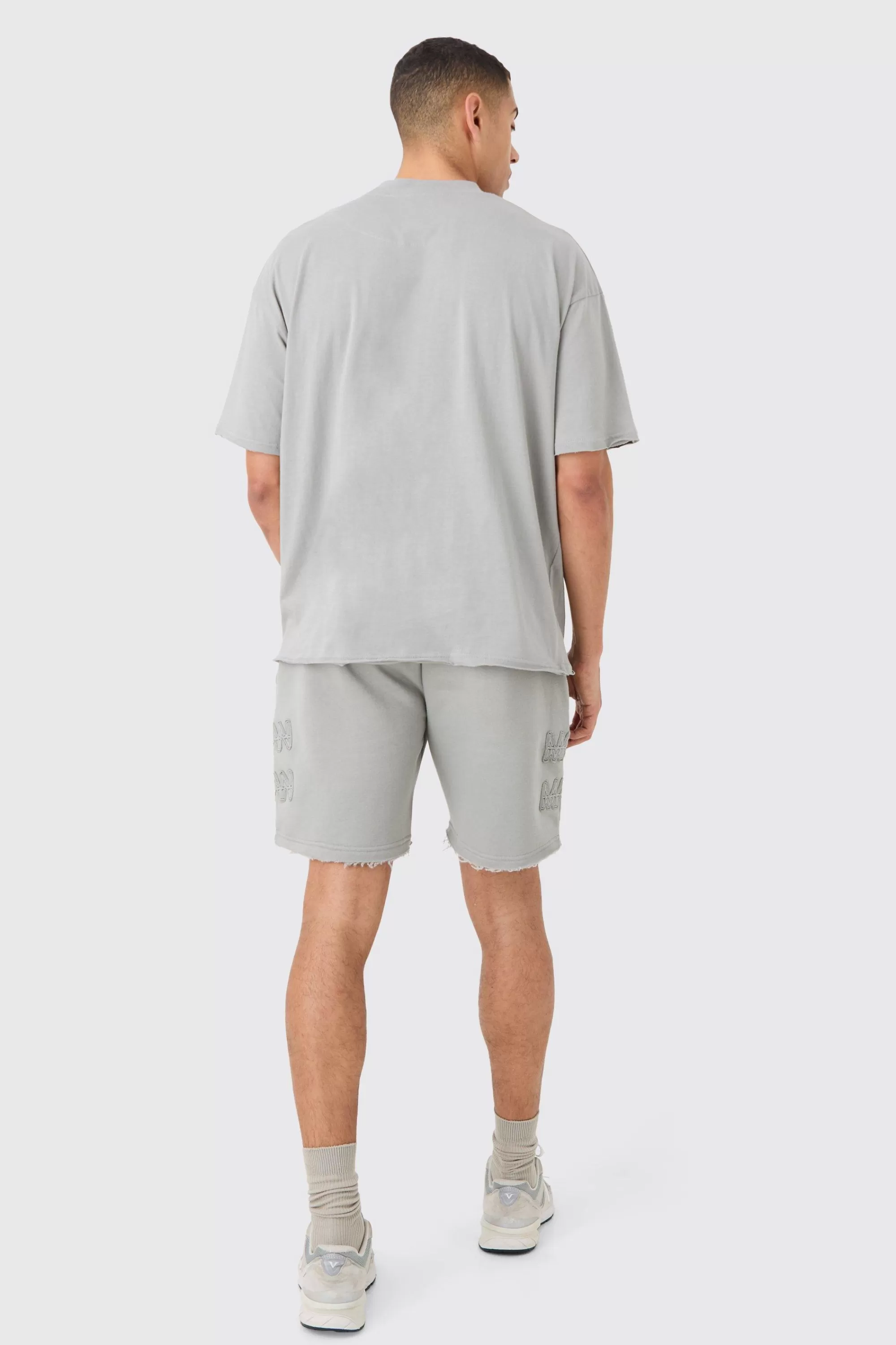 boohooMAN Boxy Man Distressed T-Shirt & Shorts Set | UK