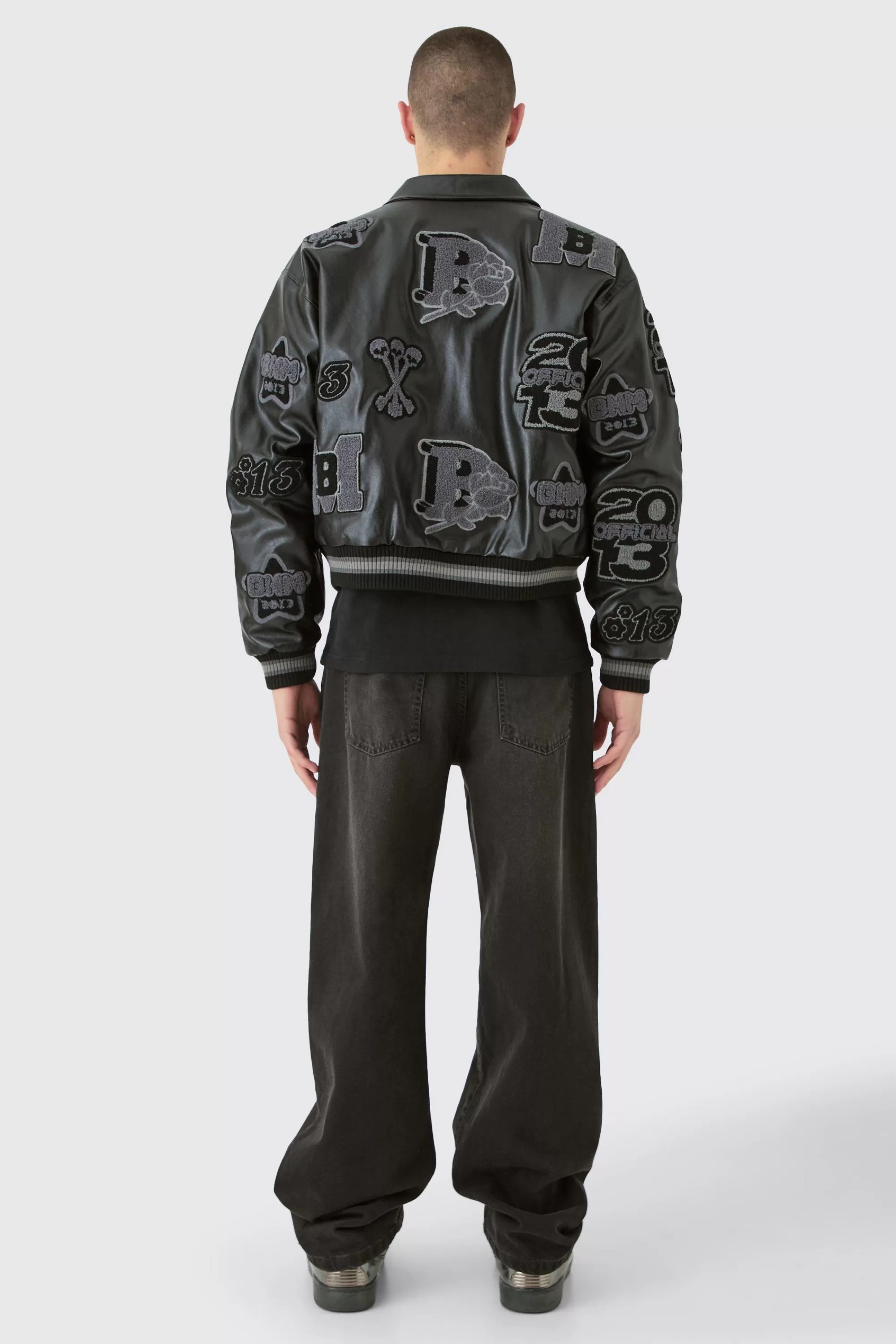 boohooMAN Boxy Pu Tonal Badge Varsity Jacket | UK