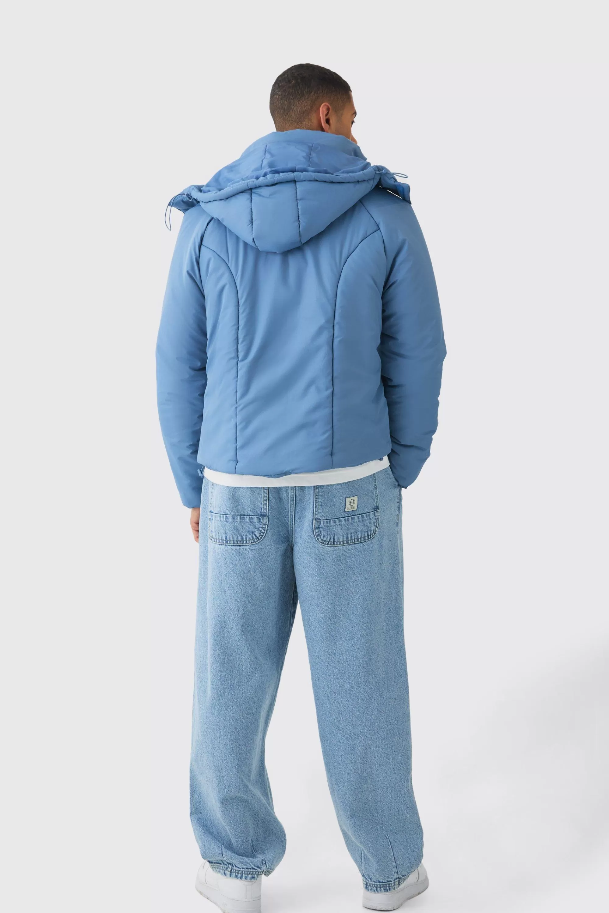 boohooMAN Boxy Quilted Hooded Puffer Coat In | UK