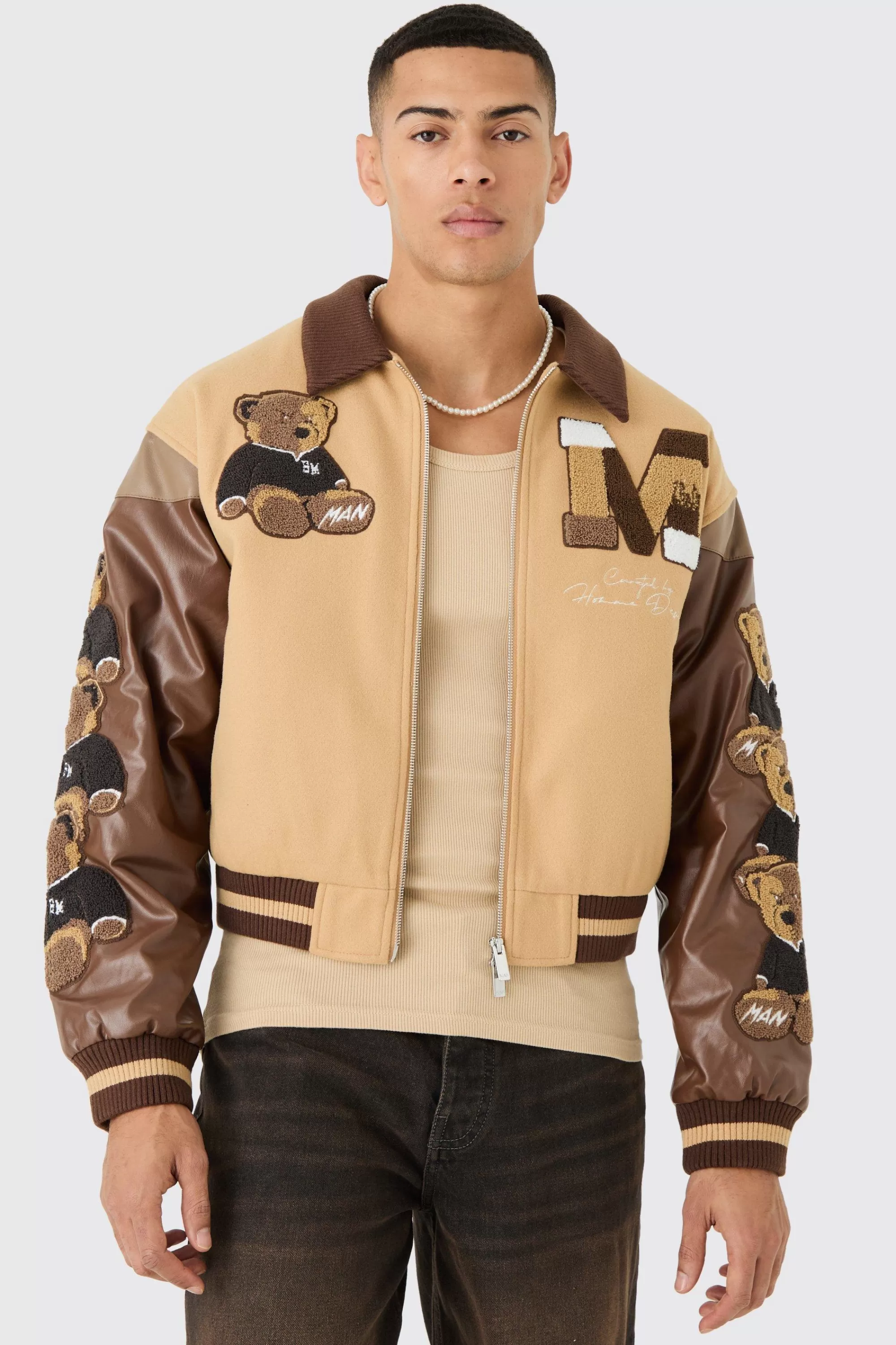 boohooMAN Boxy Teddy Badge Knitted Collar Varsity Jacket | UK