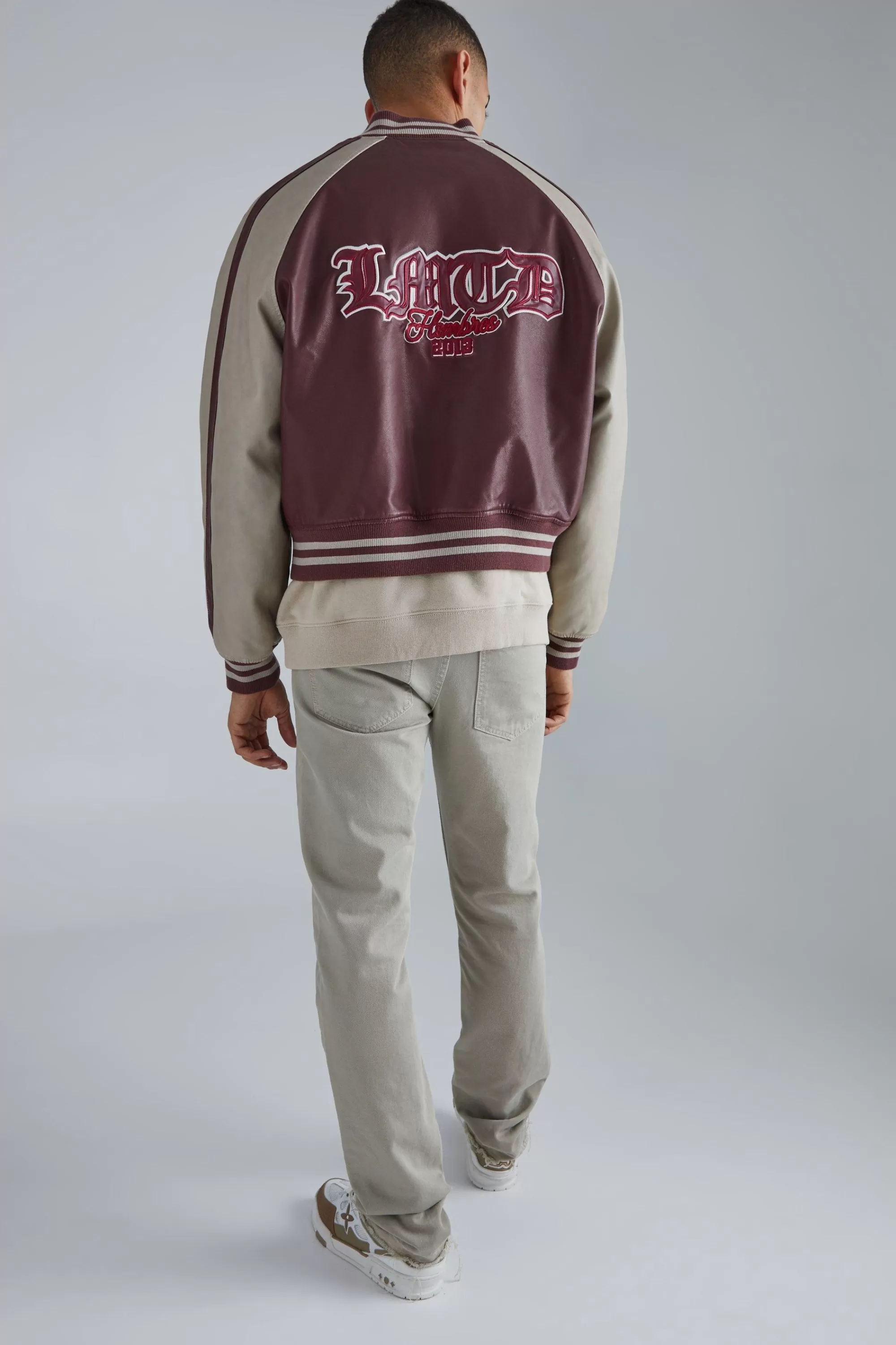 boohooMAN Boxy Tumbled Pu Pannelled Varsity Jacket | UK