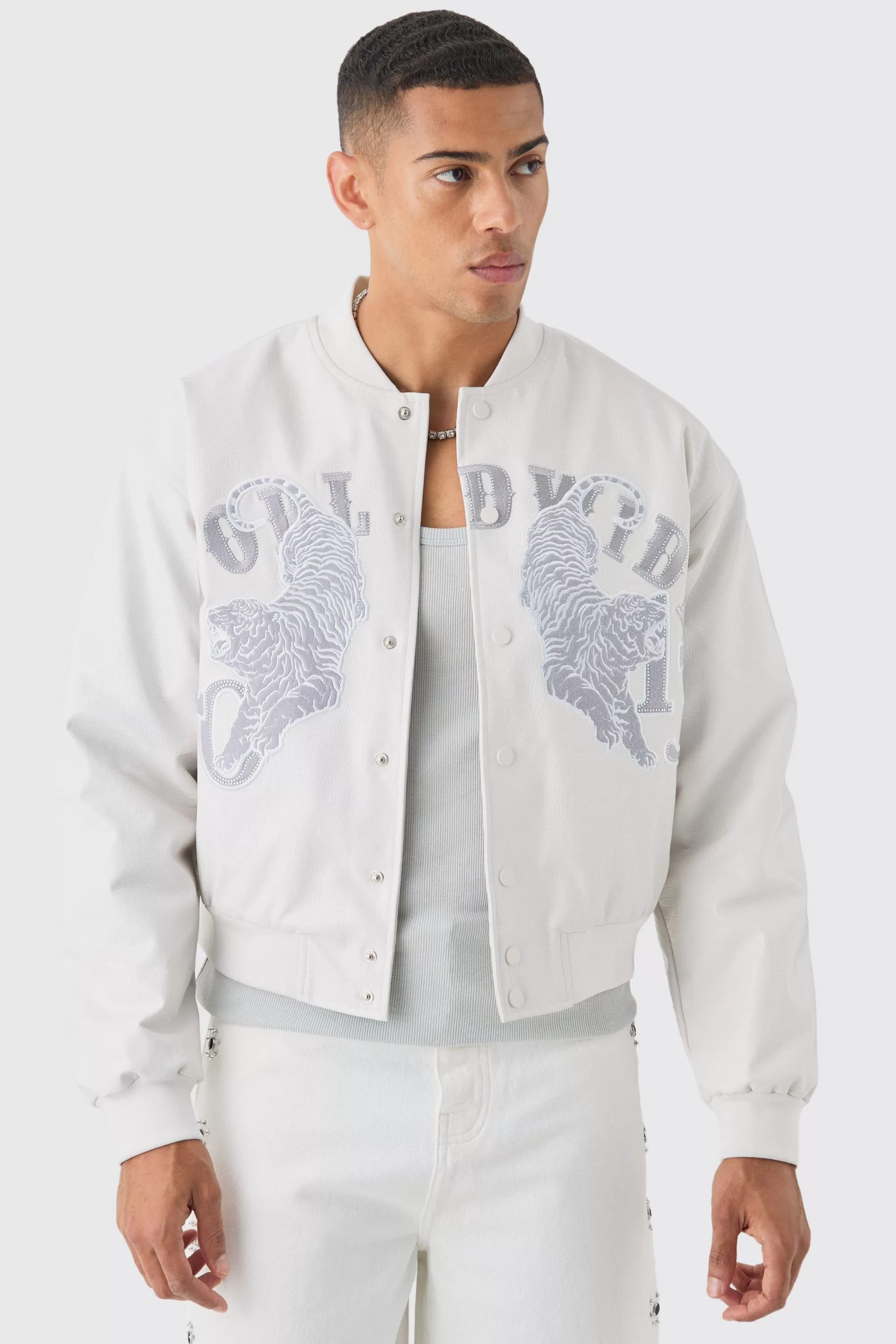 boohooMAN Boxy Worldwide Rhinestone Croc Pu Varsity Jacket In | UK