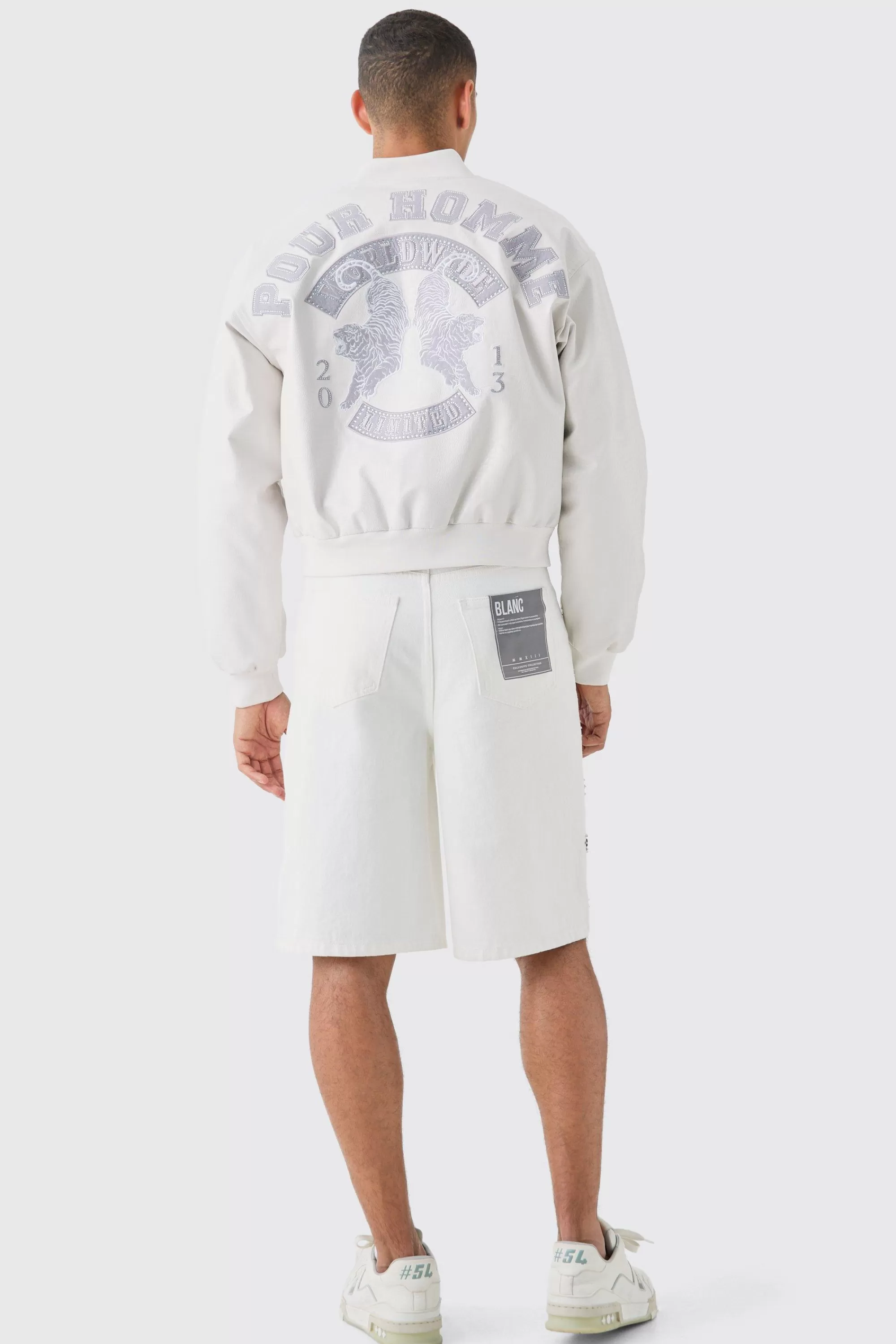 boohooMAN Boxy Worldwide Rhinestone Croc Pu Varsity Jacket In | UK