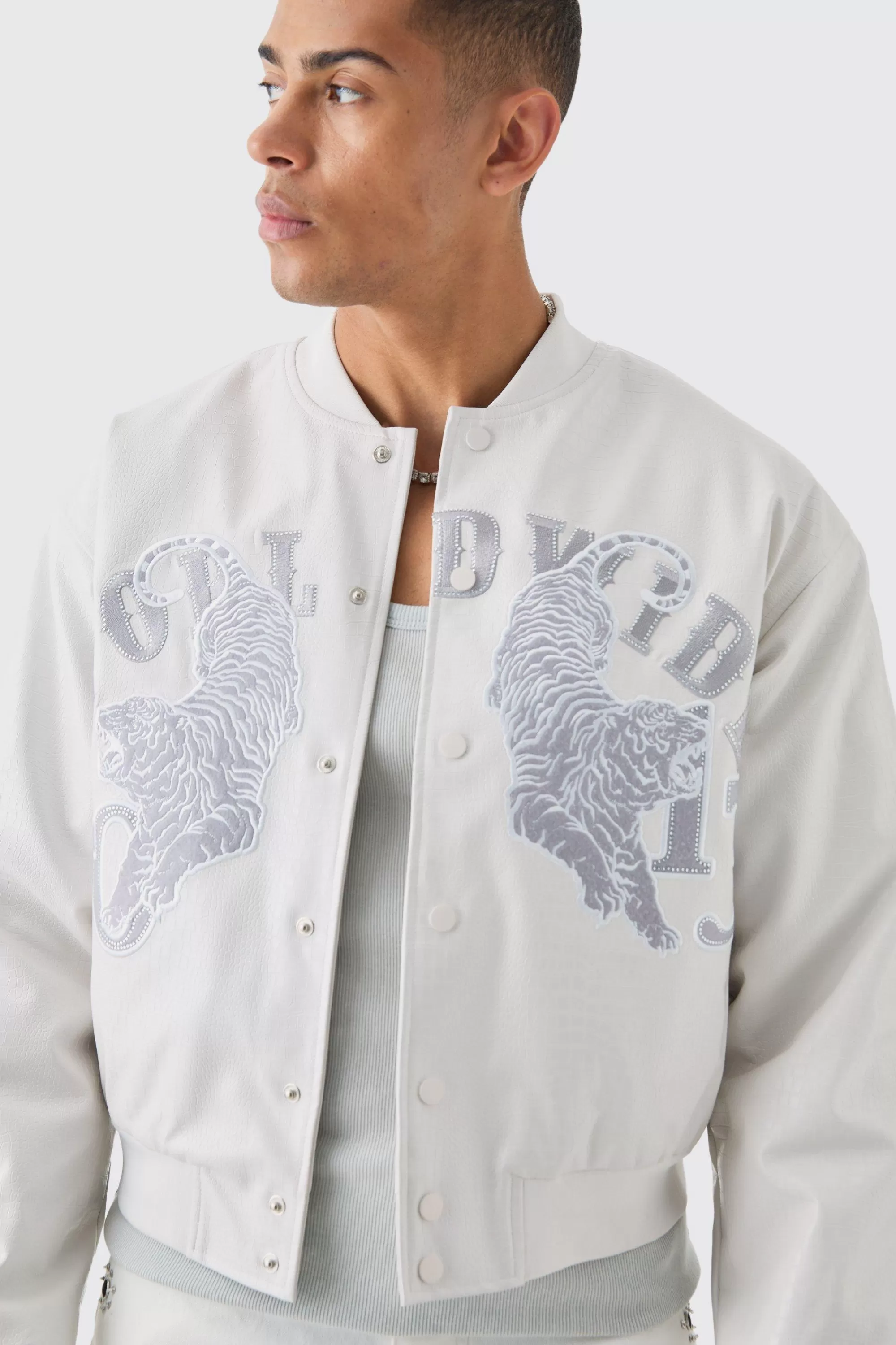 boohooMAN Boxy Worldwide Rhinestone Croc Pu Varsity Jacket In | UK