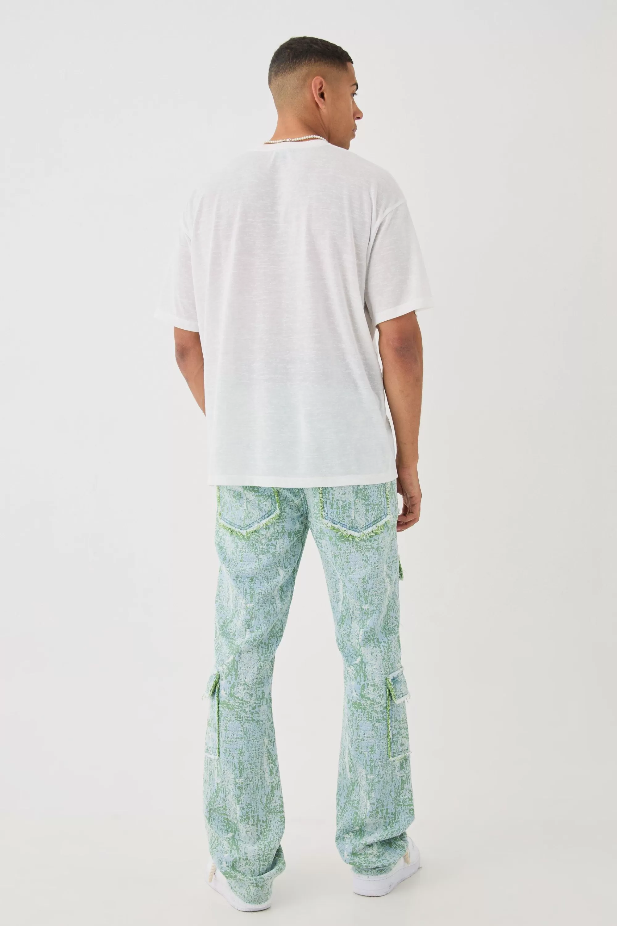 boohooMAN Denim Tapestry Stacked Cargo Flared Jeans | UK