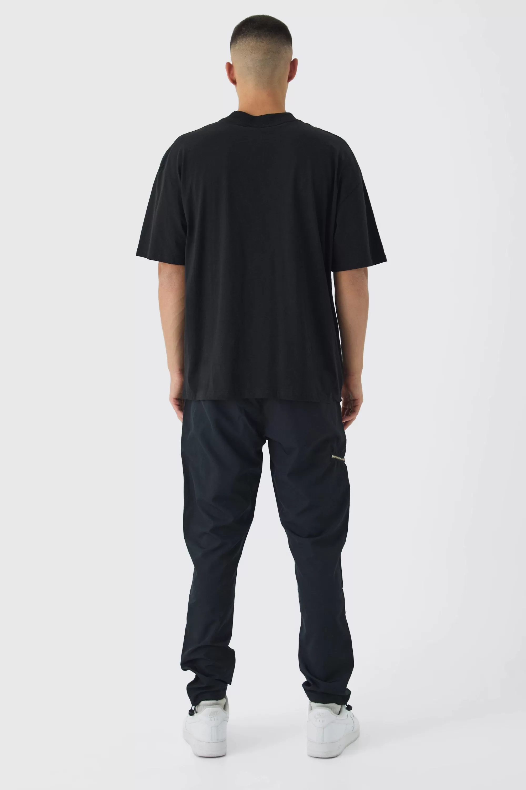 boohooMAN Elasticated Skinny Utility Zip Pocket Trousers | UK