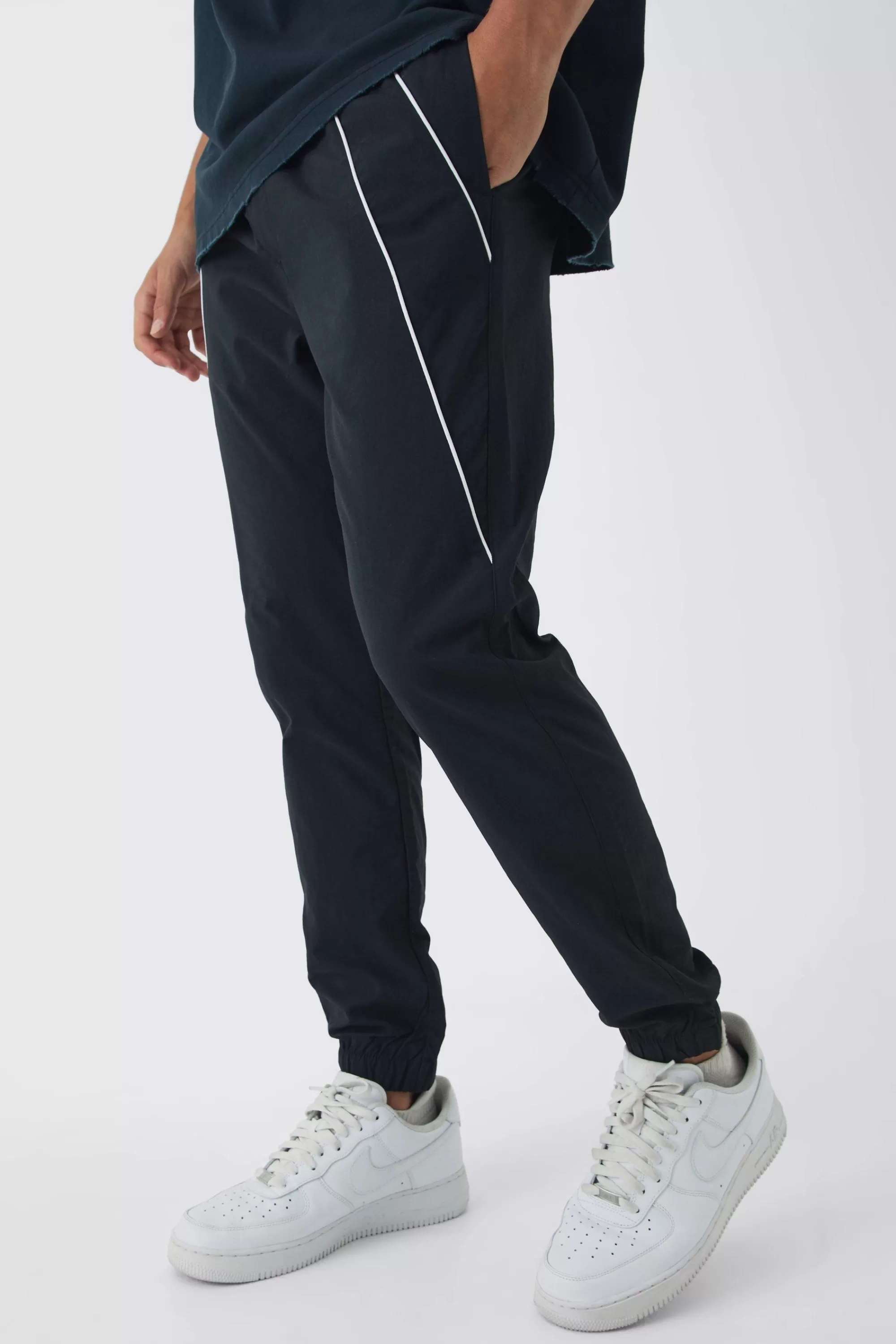 boohooMAN Elasticated Slim Cargo Piping Parachute Trousers | UK