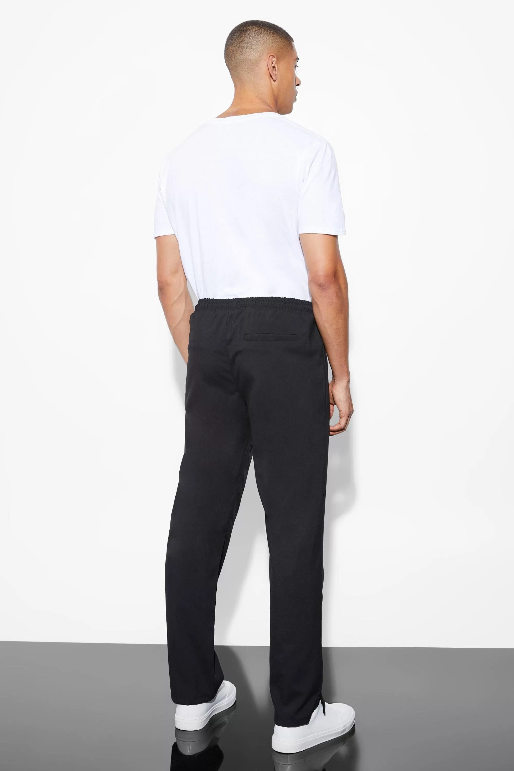 boohooMAN Elasticated Straight Leg Split Hem Trouser | UK
