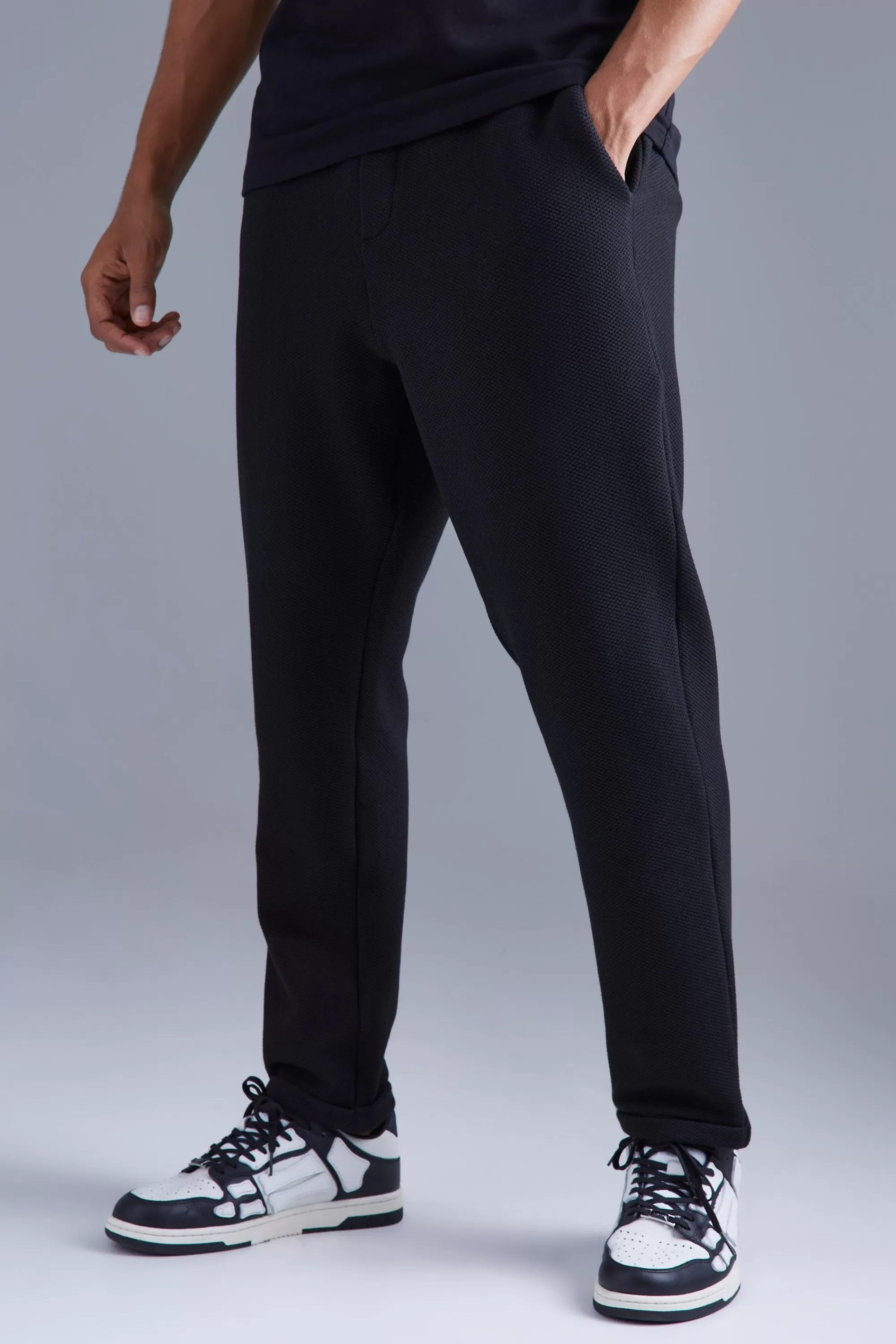 boohooMAN Elasticated Tapered Textured Smart Trousers | UK