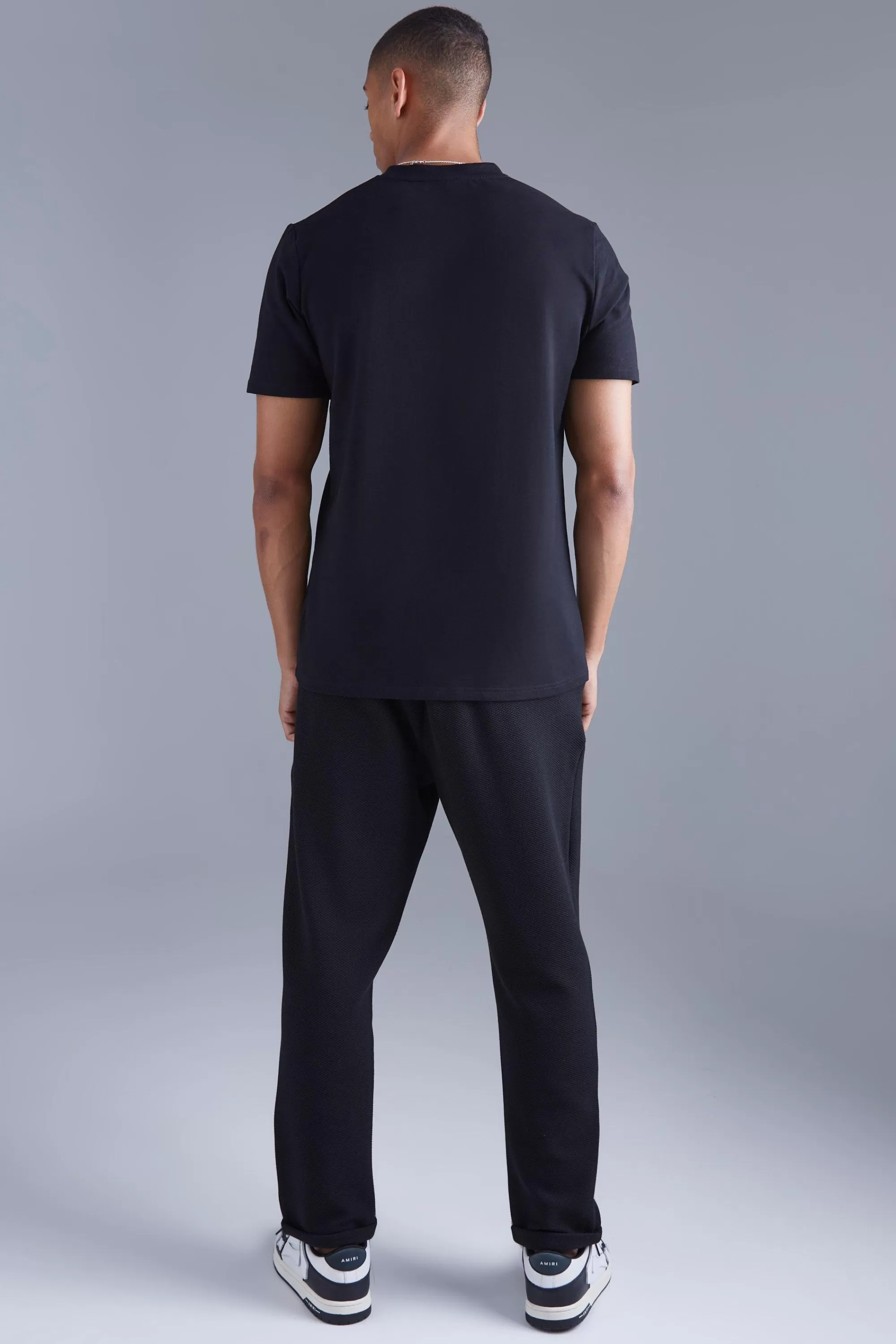 boohooMAN Elasticated Tapered Textured Smart Trousers | UK