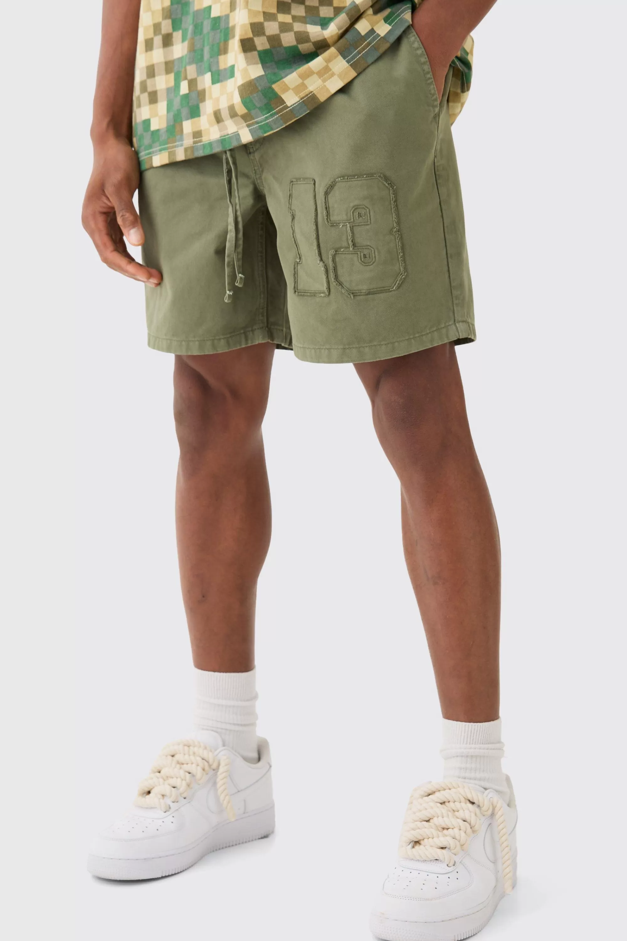 boohooMAN Elasticated Waist Applique Short Length Relaxed Shorts | UK