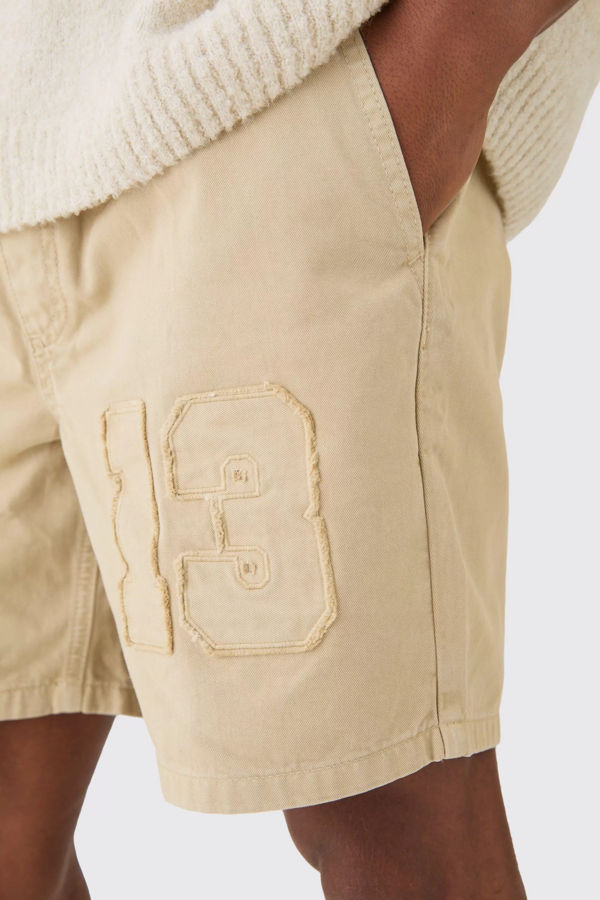 boohooMAN Elasticated Waist Applique Short Length Relaxed Shorts | UK