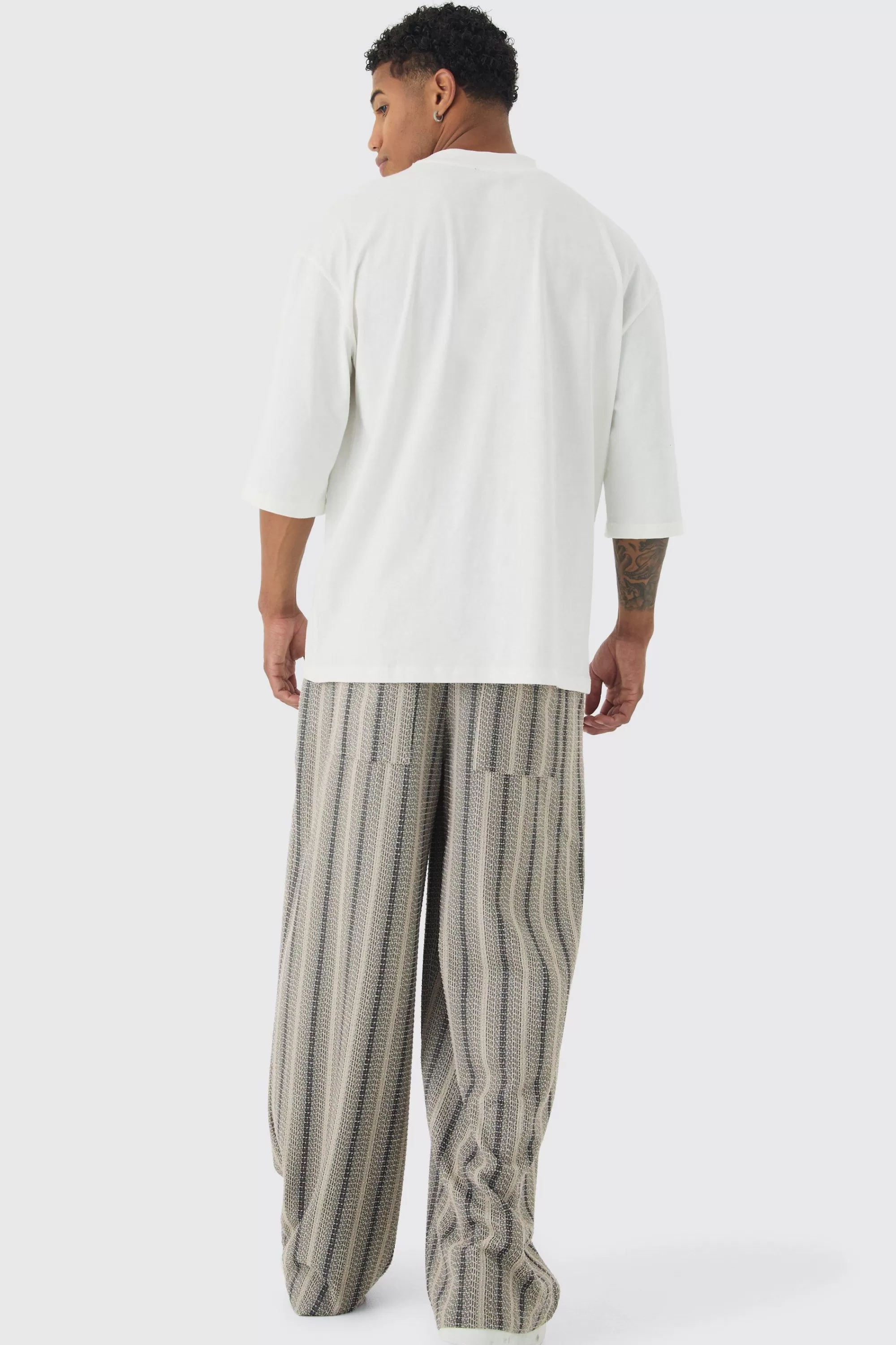 boohooMAN Elasticated Waist Baggy Boucle Trousers | UK
