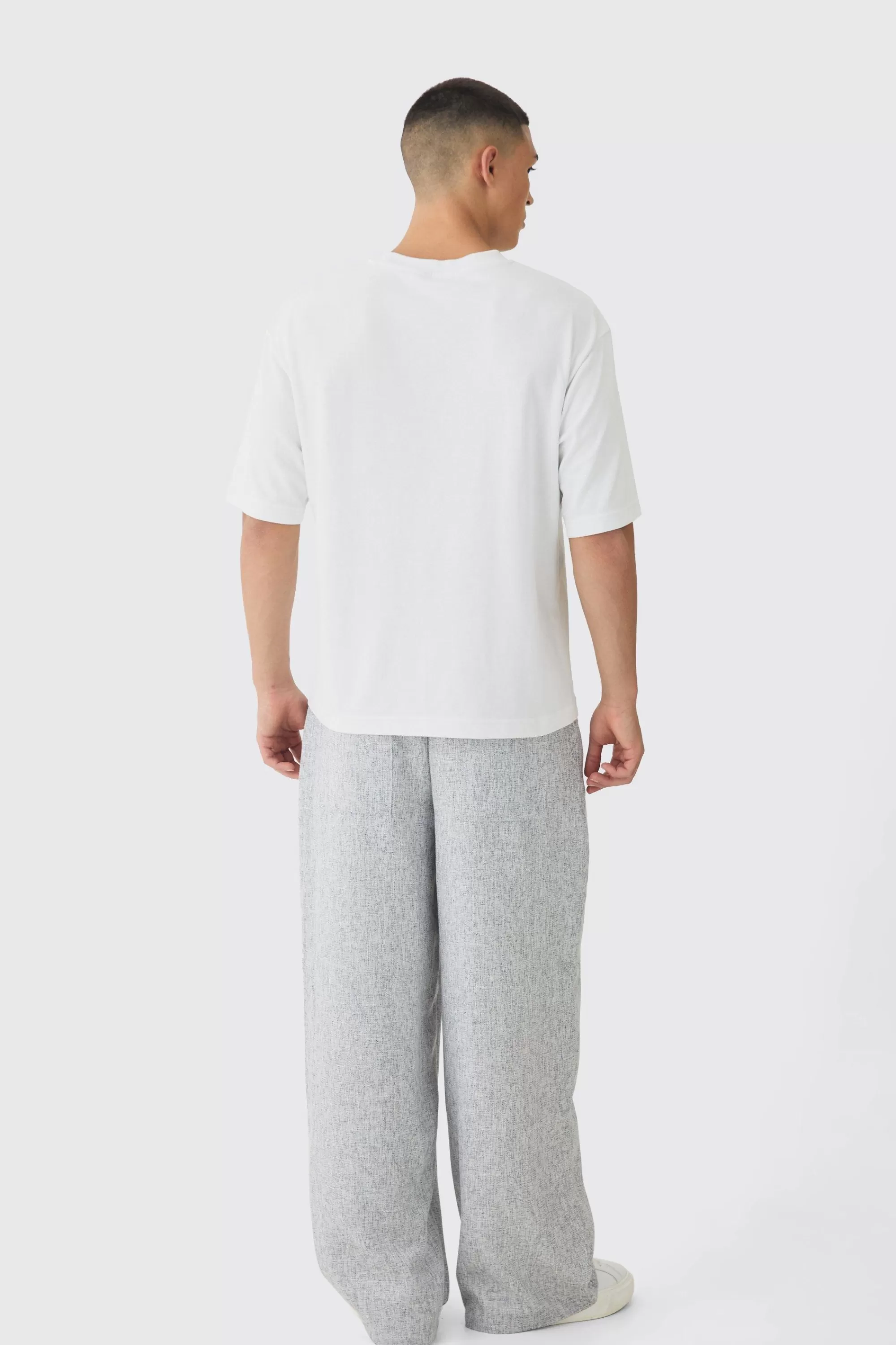 boohooMAN Elasticated Waist Baggy Textured Rope Drawcord Trousers | UK