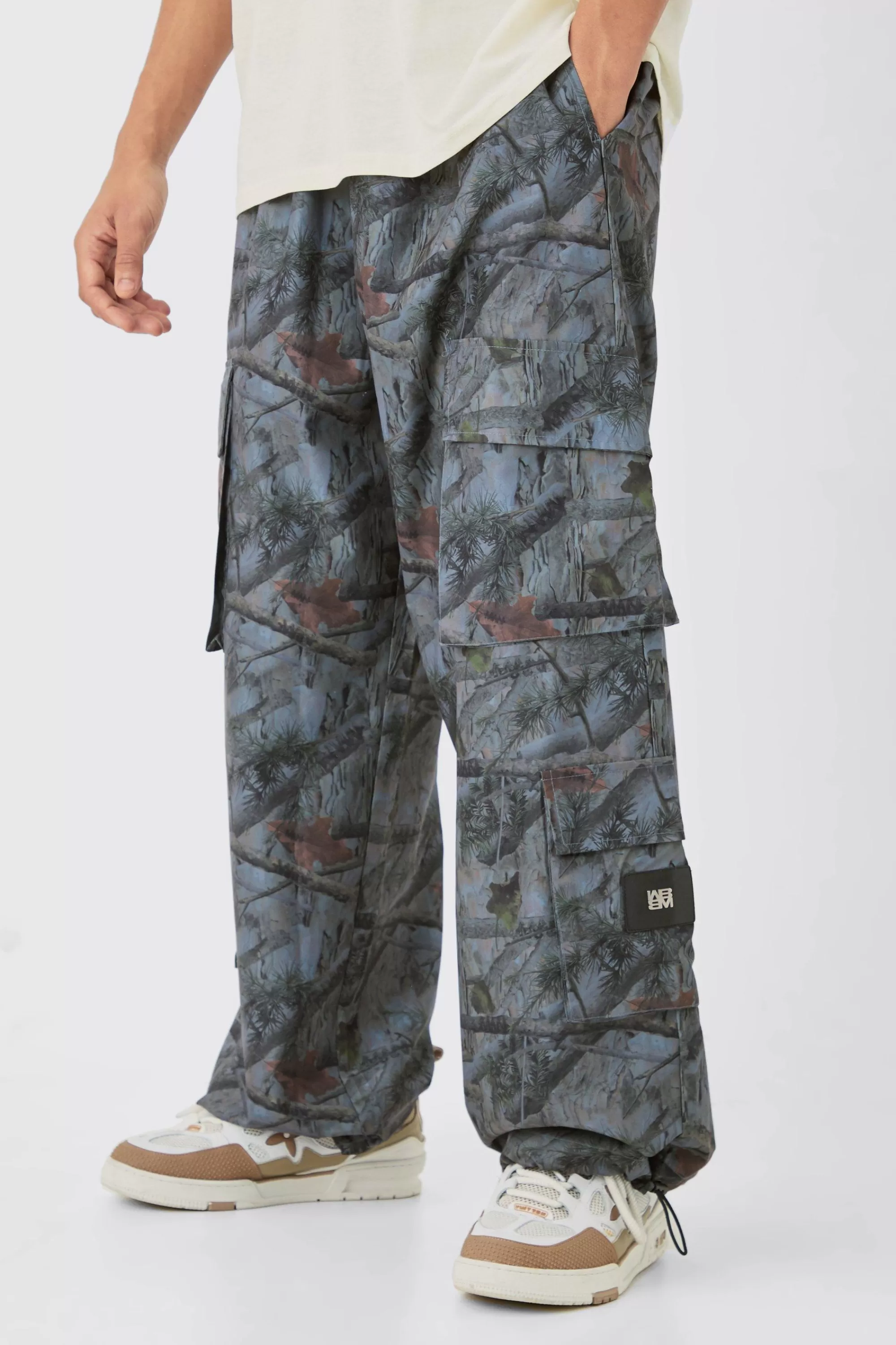 boohooMAN Elasticated Waist Camo Cargo Trousers | UK