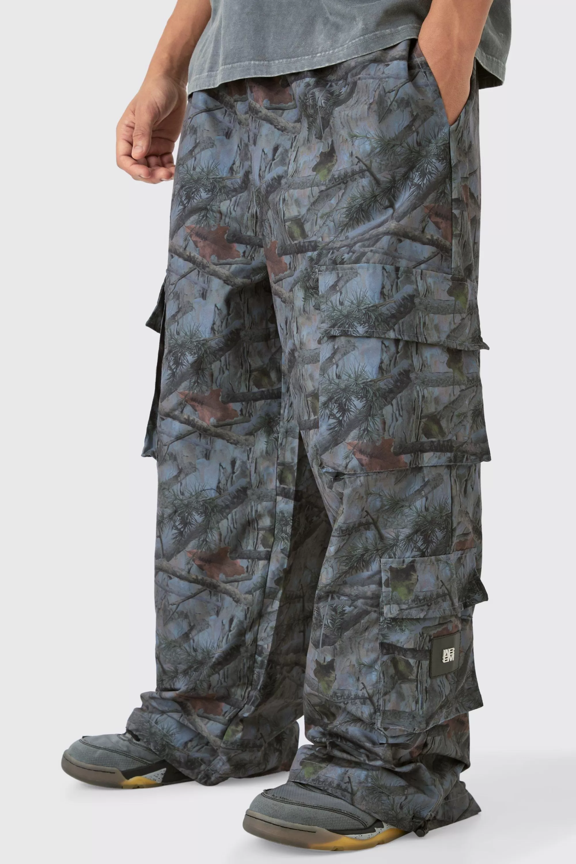 boohooMAN Elasticated Waist Camo Parachute Cargo Trousers | UK