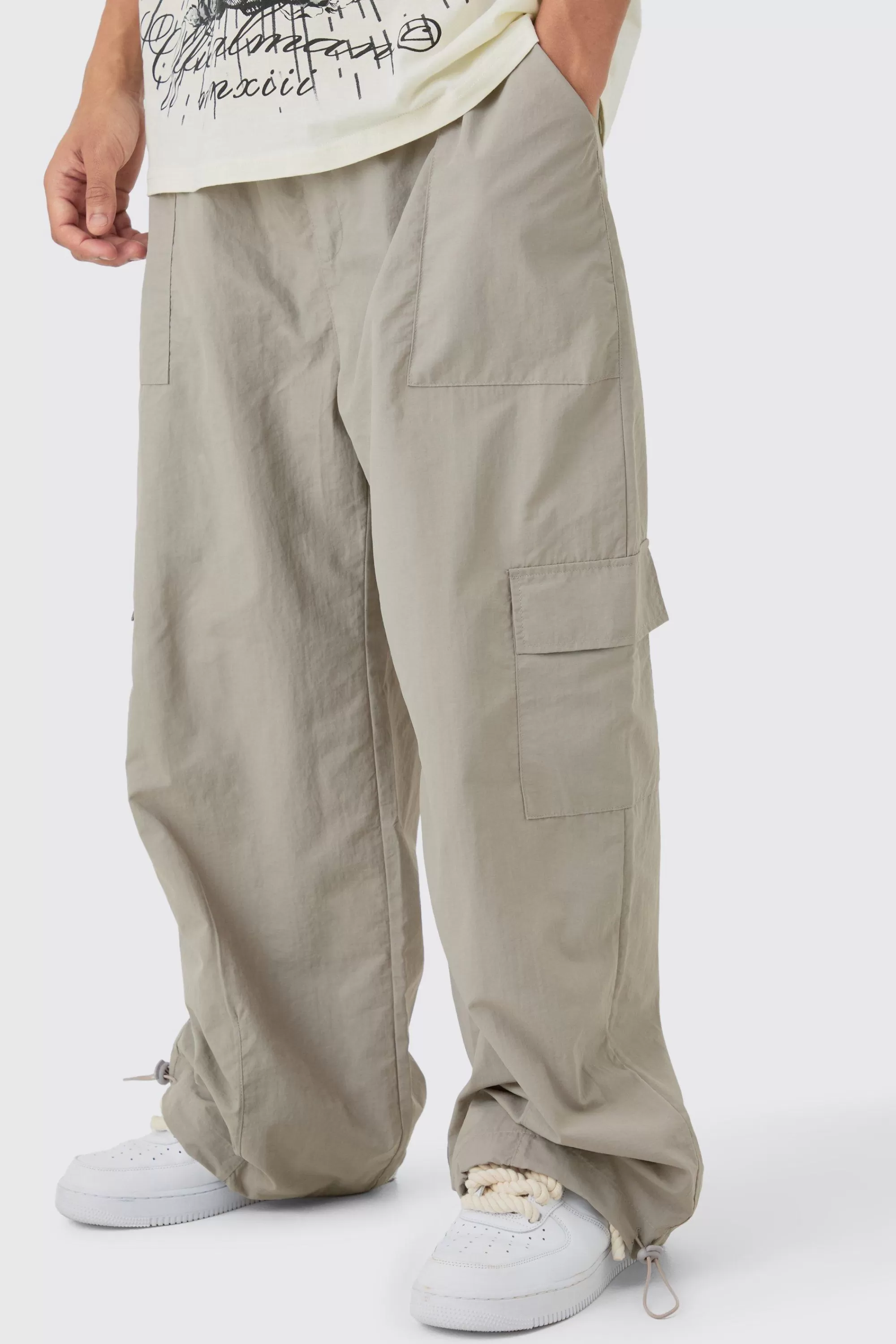 boohooMAN Elasticated Waist Cargo Pocket Parachute Trousers | UK